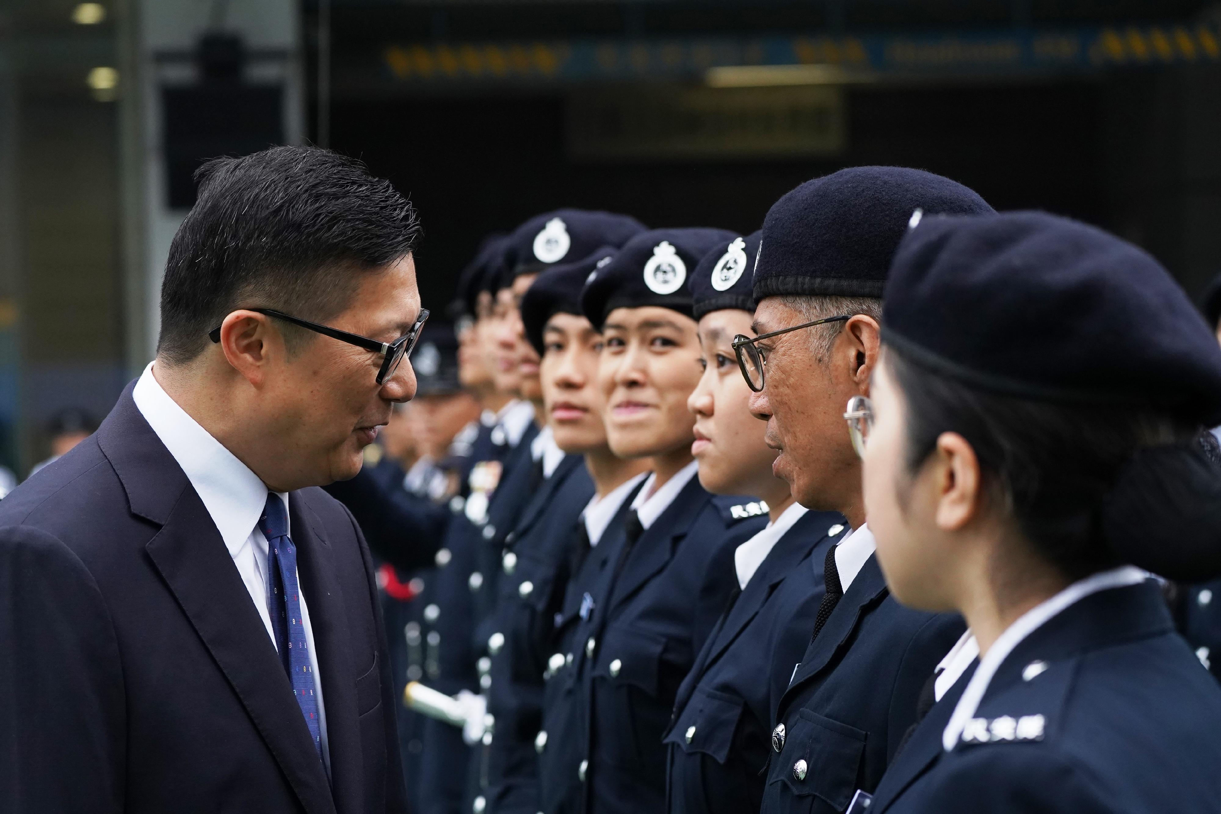 The Civil Aid Service held the Passing-out Parade for the 90th Recruits and 13th Tactical Force Secondment Scheme at its headquarters today (April 27). Photo shows the Secretary for Security, Mr Tang Ping-keung (left), inspecting the parade.