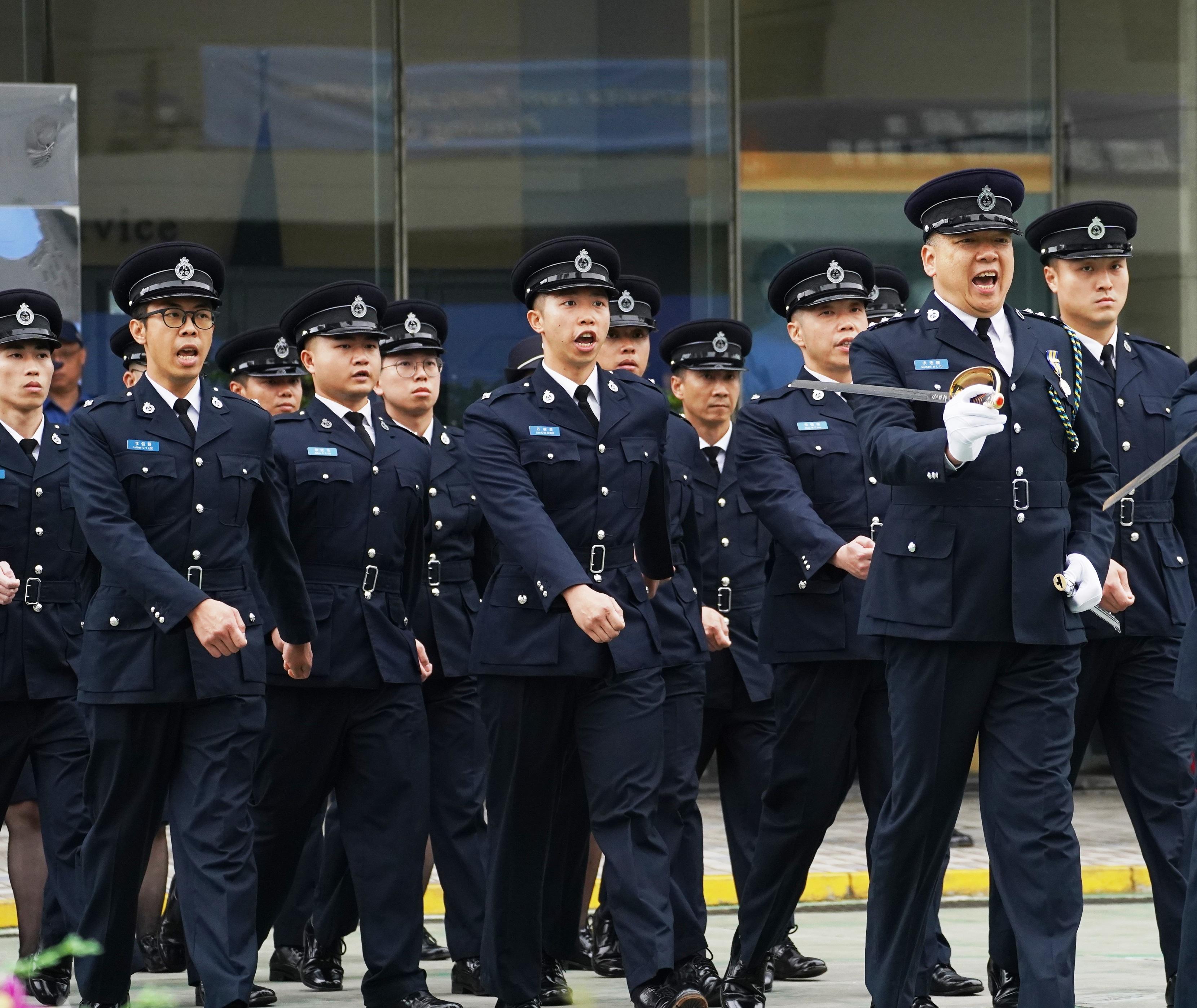 The Civil Aid Service held the Passing-out Parade for the 90th Recruits and 13th Tactical Force Secondment Scheme at its headquarters today (April 27). Photo shows the graduates marching with energy and high morale.