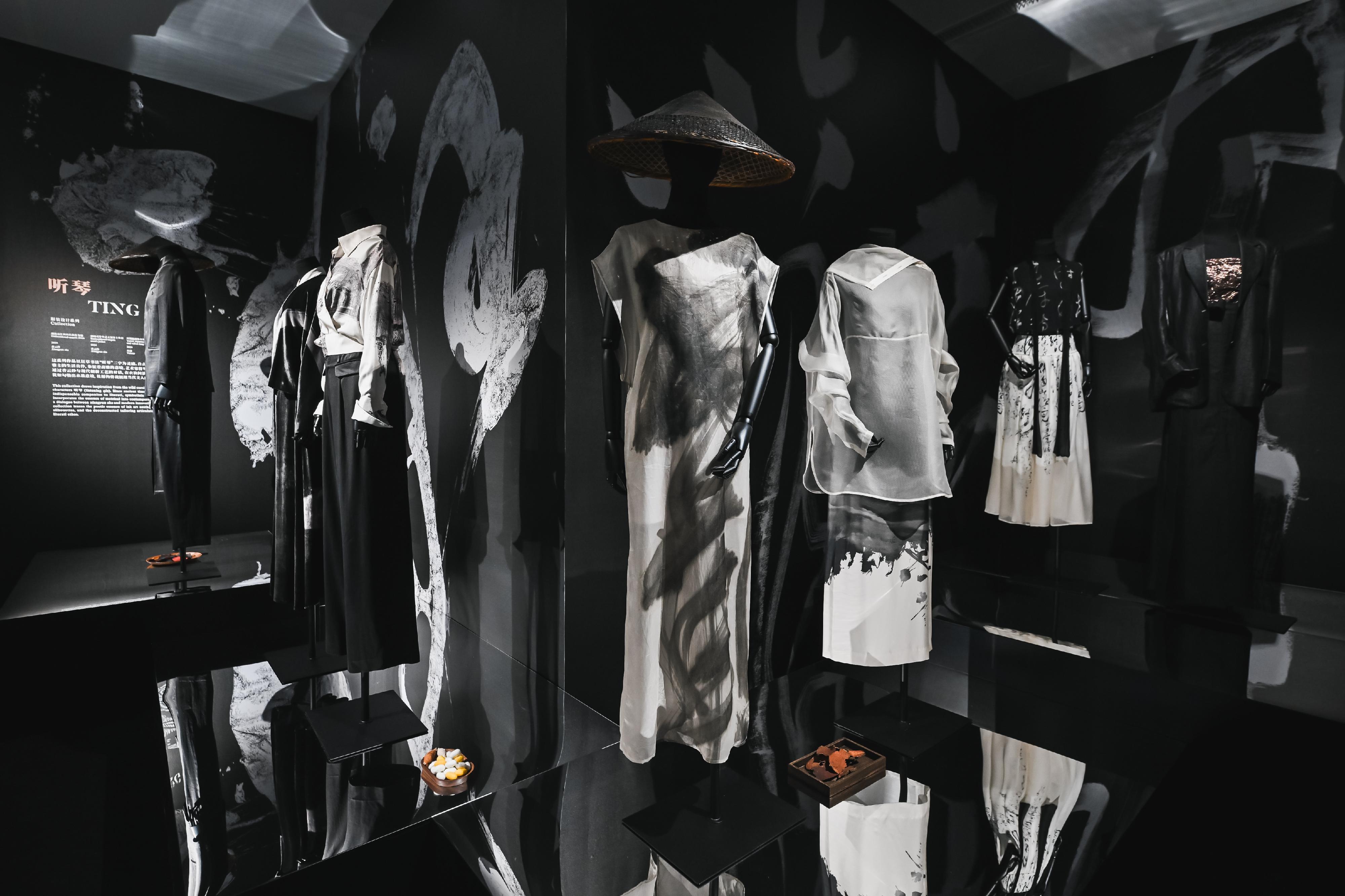 Co-organised by the Art Promotion Office and the Shenzhen Fringe Art Center, the first thematic exhibition, "Ink Impressions and Silk Inspirations" of the "Ink Art Ensembles" exhibition series in the Greater Bay Area, is on display until June 9 at the Guangming Culture and Art Center. Photo shows Mainland artist Xing Lili’s fashion creations.
