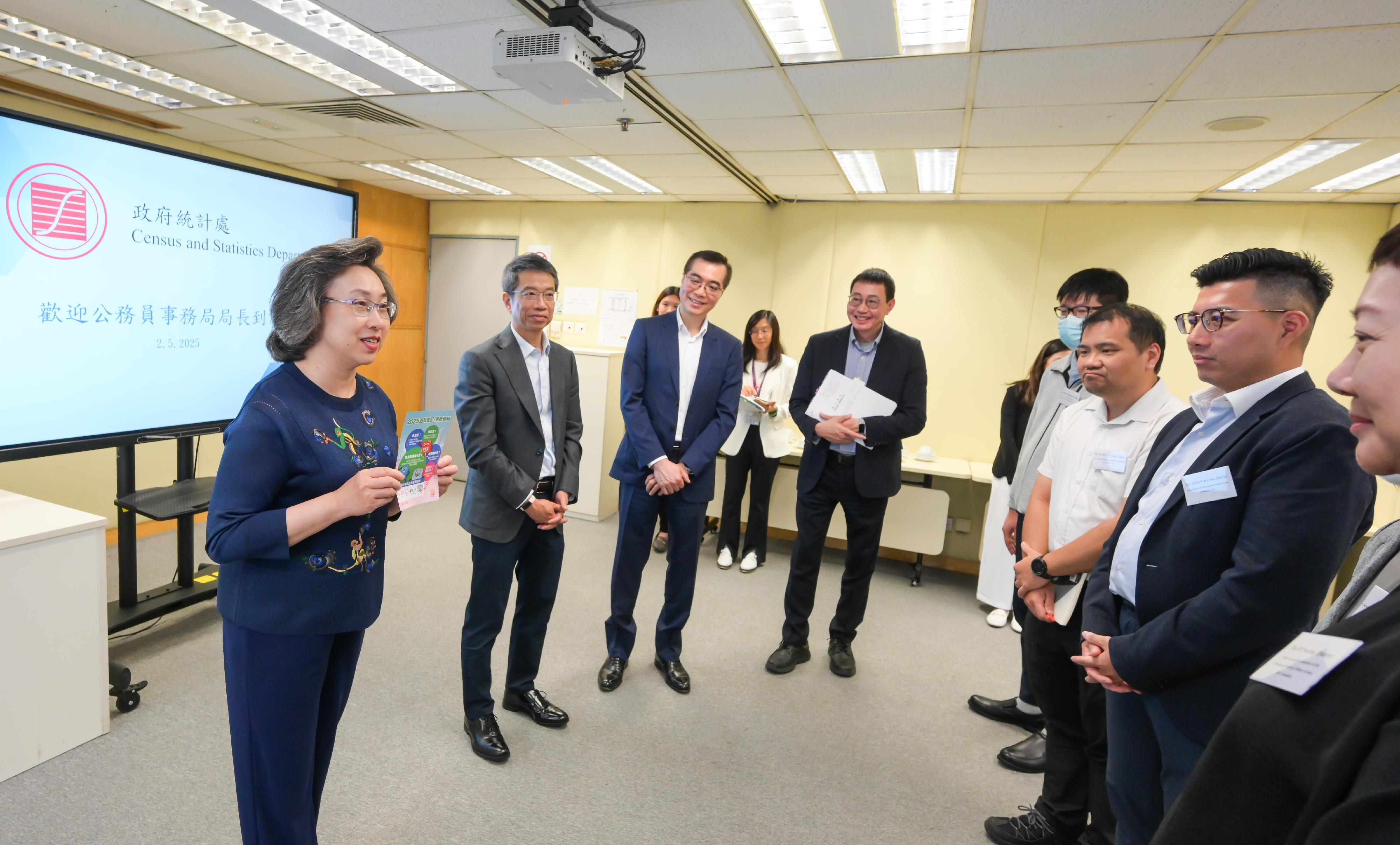 The Secretary for the Civil Service, Mrs Ingrid Yeung, visited the Census and Statistics Department this afternoon (May 2). Photo shows Mrs Yeung (first left) meeting with staff representatives of various grades in the department to exchange views on matters that concerned them. She also took the opportunity to appeal to colleagues to register as voters to fulfil their civic responsibility and asked them to pass on the message to their families and friends, so as to cast their votes in the 2025 Legislative Council General Election to be held at the end of this year. Looking on are the Permanent Secretary for the Civil Service, Mr Clement Leung (second left), and the Commissioner for Census and Statistics, Mr Leo Yu (third left).