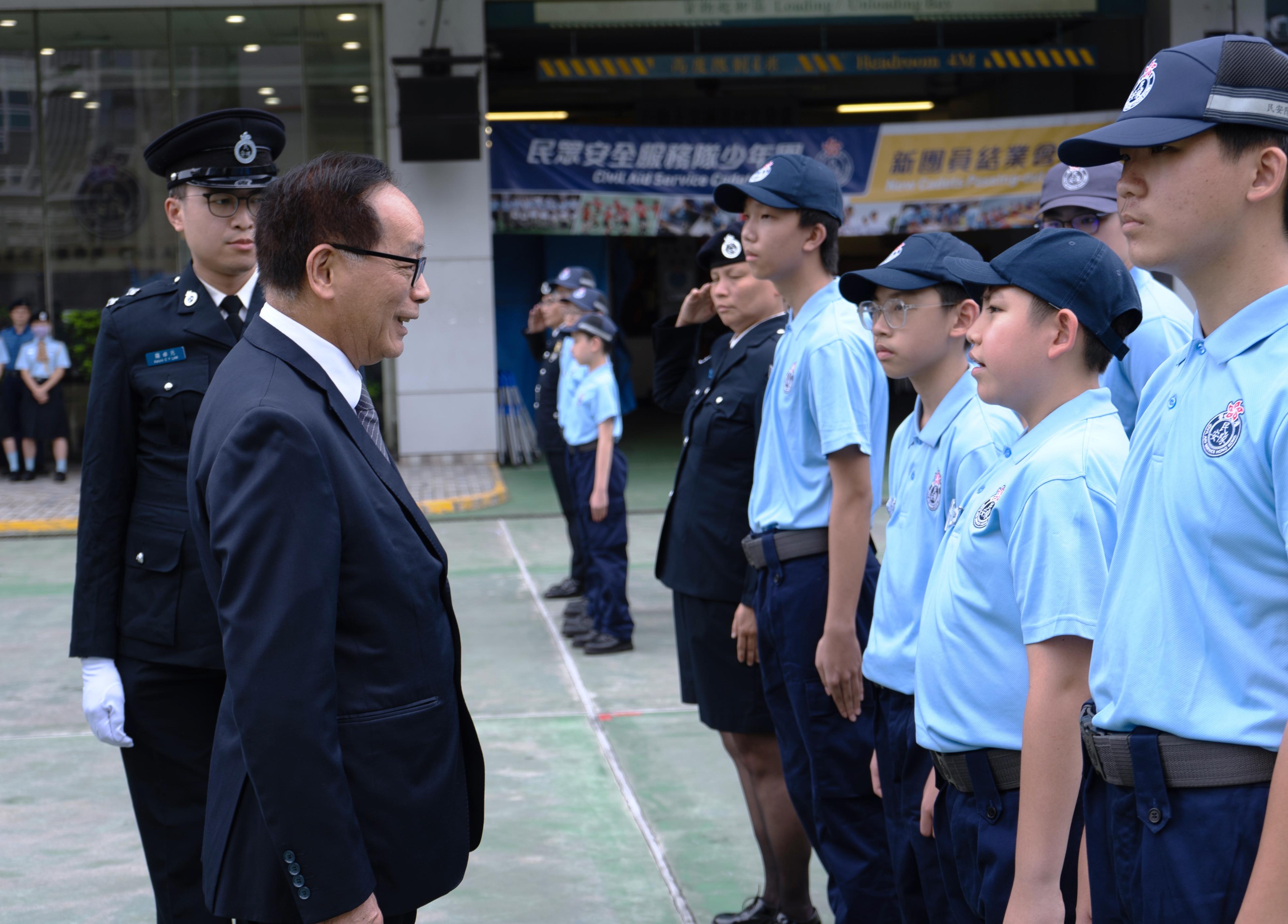 The Civil Aid Service Cadet Corps held the 147th New Cadets Passing-out Parade today (May 3). Photo shows former Hong Kong deputy to the National People's Congress Mr Ip Kwok-him (second left) inspecting the parade.
