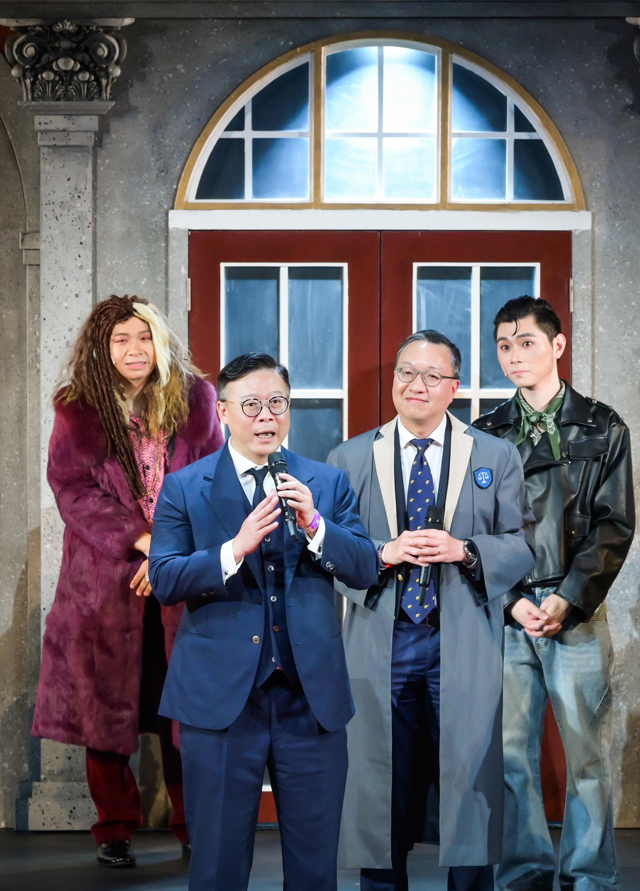 The Department of Justice held a large-scale Rule of Law Drama Day today (May 3) at the Grand Theatre of the Hong Kong Cultural Centre, presenting the drama "Rule of Law Academy - Adventure to the Stars" under the "Rule of Law through Drama" project. Photo shows the Secretary for Justice, Mr Paul Lam, SC (second right), and the Deputy Secretary for Justice, Dr Cheung Kwok-kwan (second left), performing onstage.