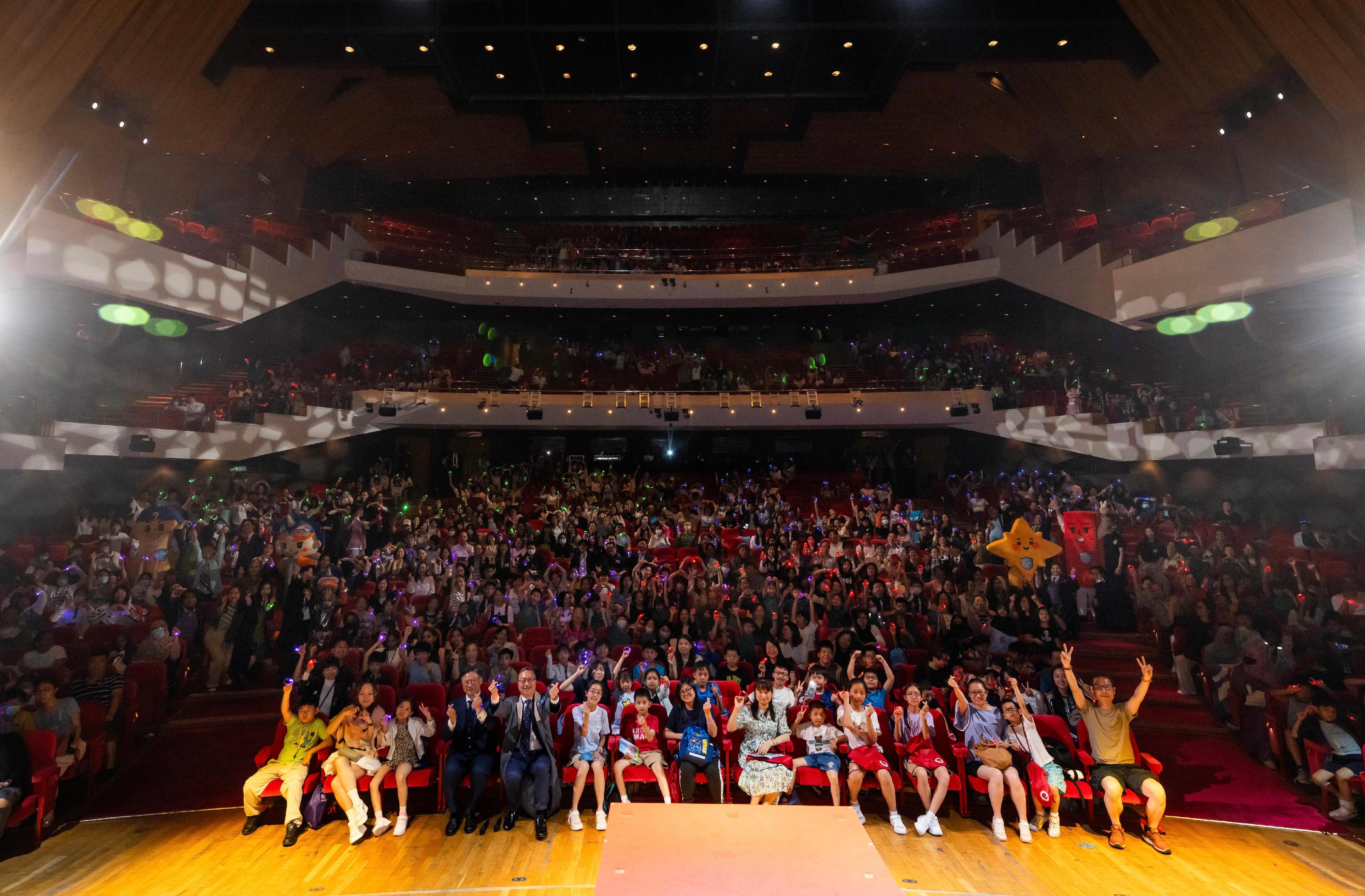 The Department of Justice held a large-scale Rule of Law Drama Day today (May 3) at the Grand Theatre of the Hong Kong Cultural Centre, presenting the drama "Rule of Law Academy - Adventure to the Stars" under the "Rule of Law through Drama" project. Photo shows the Secretary for Justice, Mr Paul Lam, SC (front row, fifth left), and the Deputy Secretary for Justice, Dr Cheung Kwok-kwan (front row, fourth left) and the audience.
