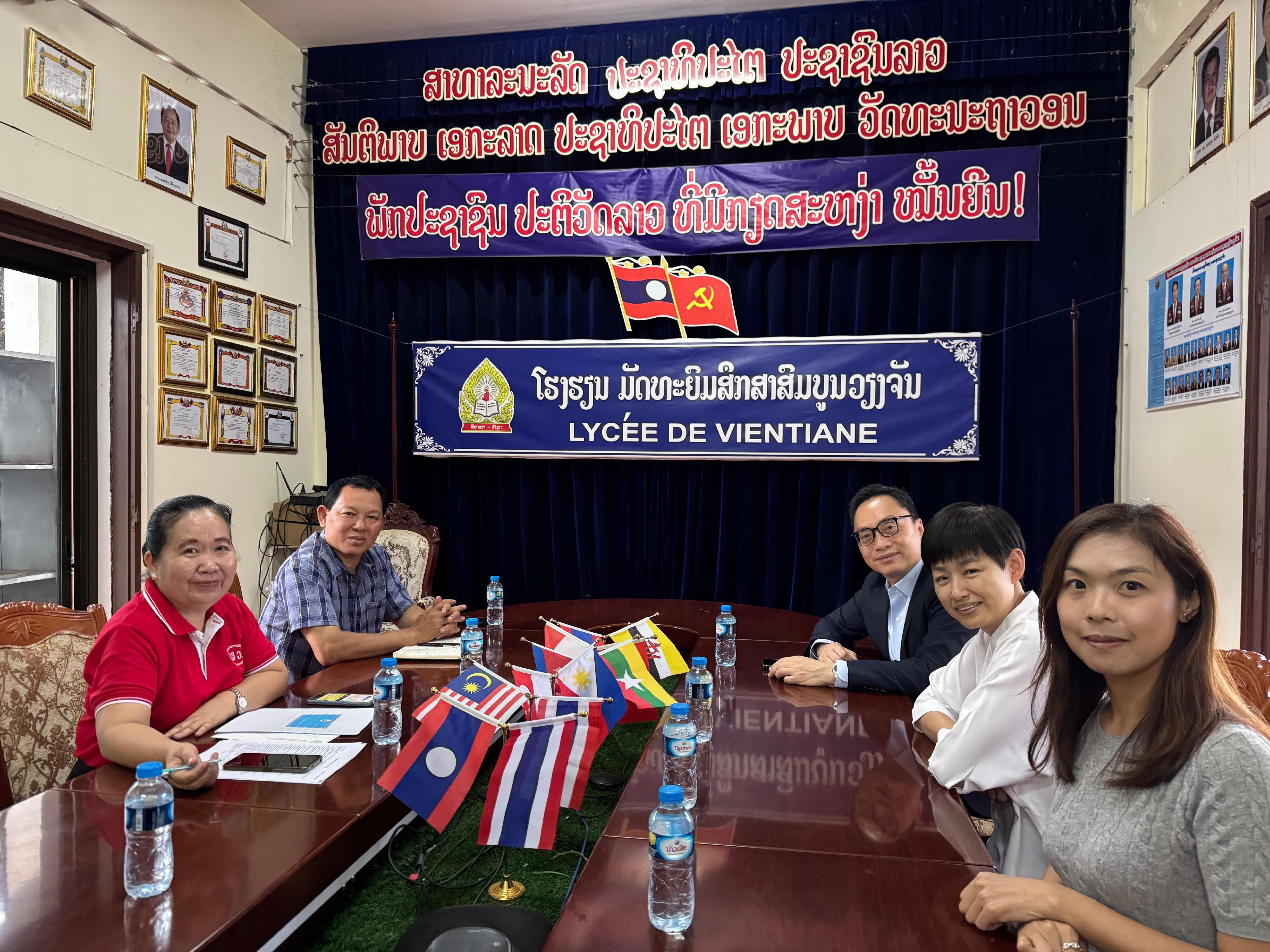 The Hong Kong Economic and Trade Office in Singapore (Singapore ETO) concluded an official visit to Vientiane, the capital of Laos, between May 6 and 7 (Vientiane time). The visit aimed to deepen understanding and collaboration with the Laotian government and business sectors, while further strengthening bilateral relations in trade, investment, and people-to-people exchanges. Members of the Singapore ETO visited Vientiane Secondary School to learn about the implementation of a Memorandum of Understanding (MOU) signed between the school and the Hong Kong Polytechnic University. The MOU, announced by the Chief Executive, Mr John Lee, last July during his visit to the school, offers a dedicated scholarship programme for outstanding students at Vientiane Secondary School. Photo shows the Director of the Singapore ETO, Mr Owin Fung (third right), and representatives of the Singapore ETO and Vientiane Secondary School after the meeting.