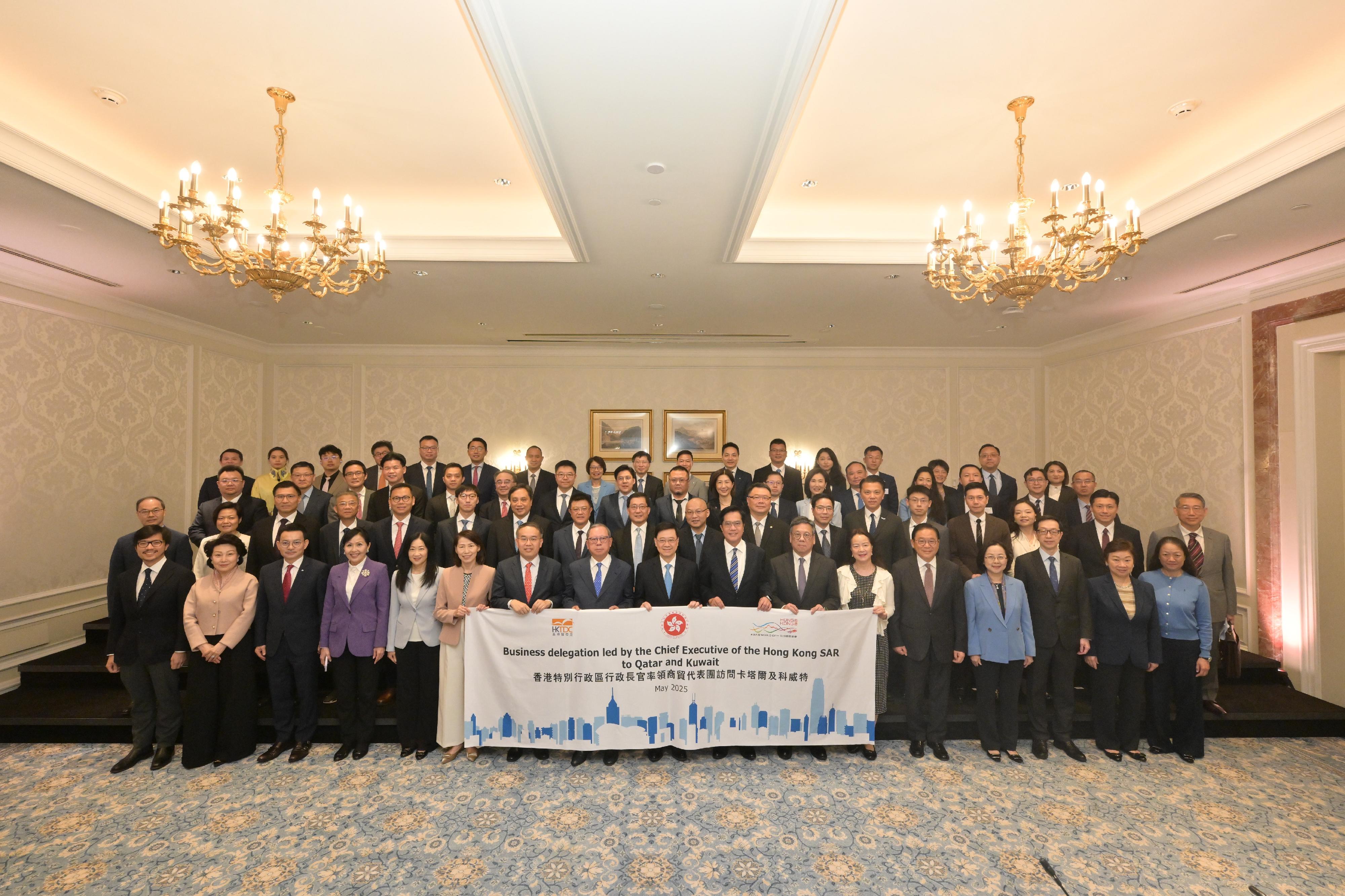 The Chief Executive, Mr John Lee, today (May 11) led a business delegation comprising representatives from Hong Kong and Mainland enterprises to commence its visit programme to Qatar. Photo shows Mr Lee (front row, centre); the Deputy Financial Secretary, Mr Michael Wong (front row, eighth right); the Secretary for Financial Services and the Treasury, Mr Christopher Hui (front row, seventh left); the Secretary for Commerce and Economic Development, Mr Algernon Yau (front row, seventh right); the Director of the Chief Executive's Office, Ms Carol Yip (front row, sixth left); the Director-General of the Hong Kong and Macao Affairs Office of the Hubei Provincial People's Government, Ms Zhang Xiaomei (front row, sixth right); the Commissioner for Belt and Road, Mr Nicholas Ho (front row, first left); the Director of Information Services, Mrs Apollonia Liu (front row, first right); the Chairman of the Hong Kong Trade Development Council (HKTDC), Dr Peter Lam (front row, eighth left); the Executive Director of the HKTDC, Ms Margaret Fong (front row, fifth left); and members of the delegation.