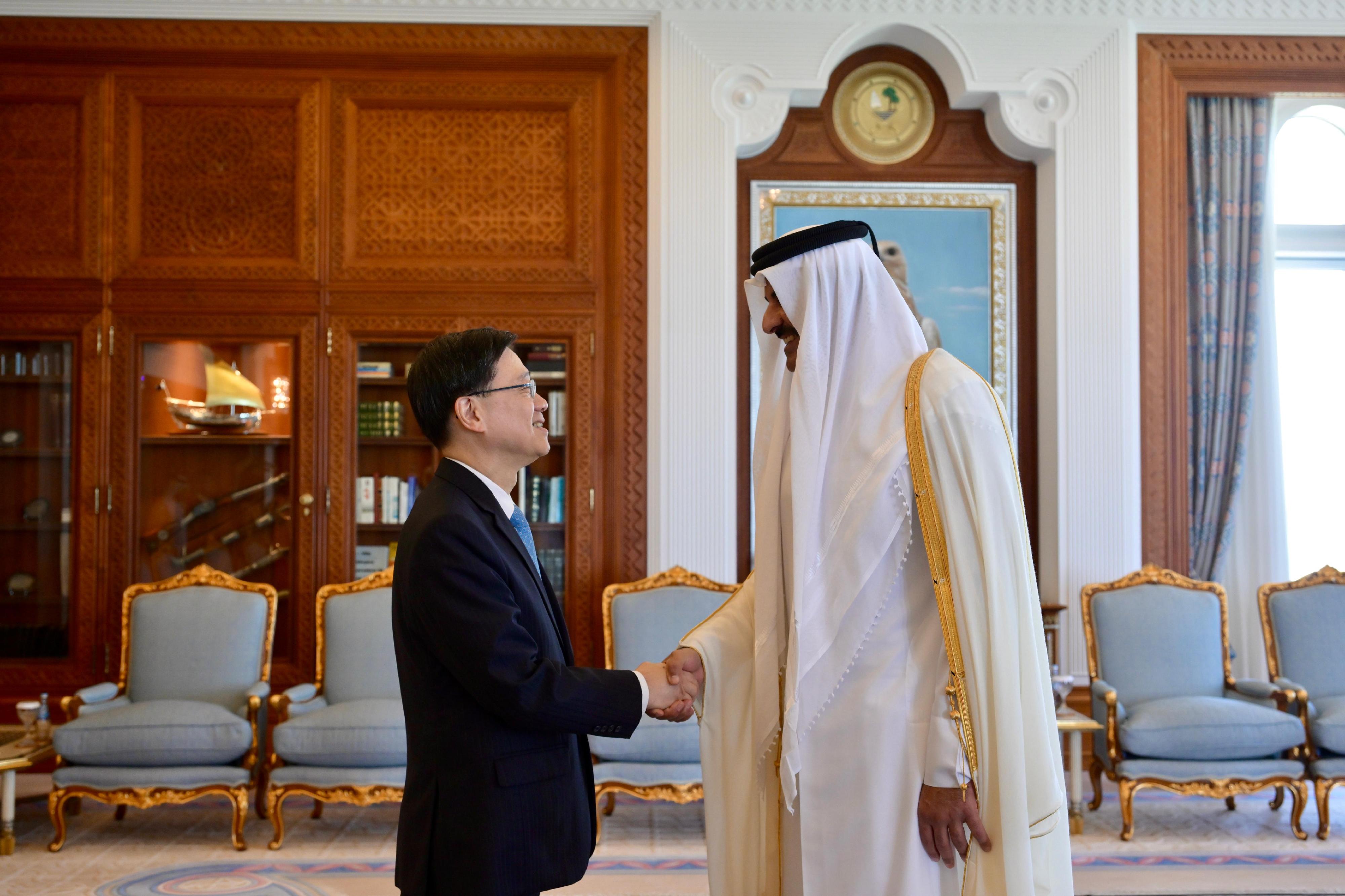 The Chief Executive, Mr John Lee (left), meets with the Amir (head of state) of Qatar, Mr Tamim bin Hamad Al Thani (right), in Qatar, today (May 11).
