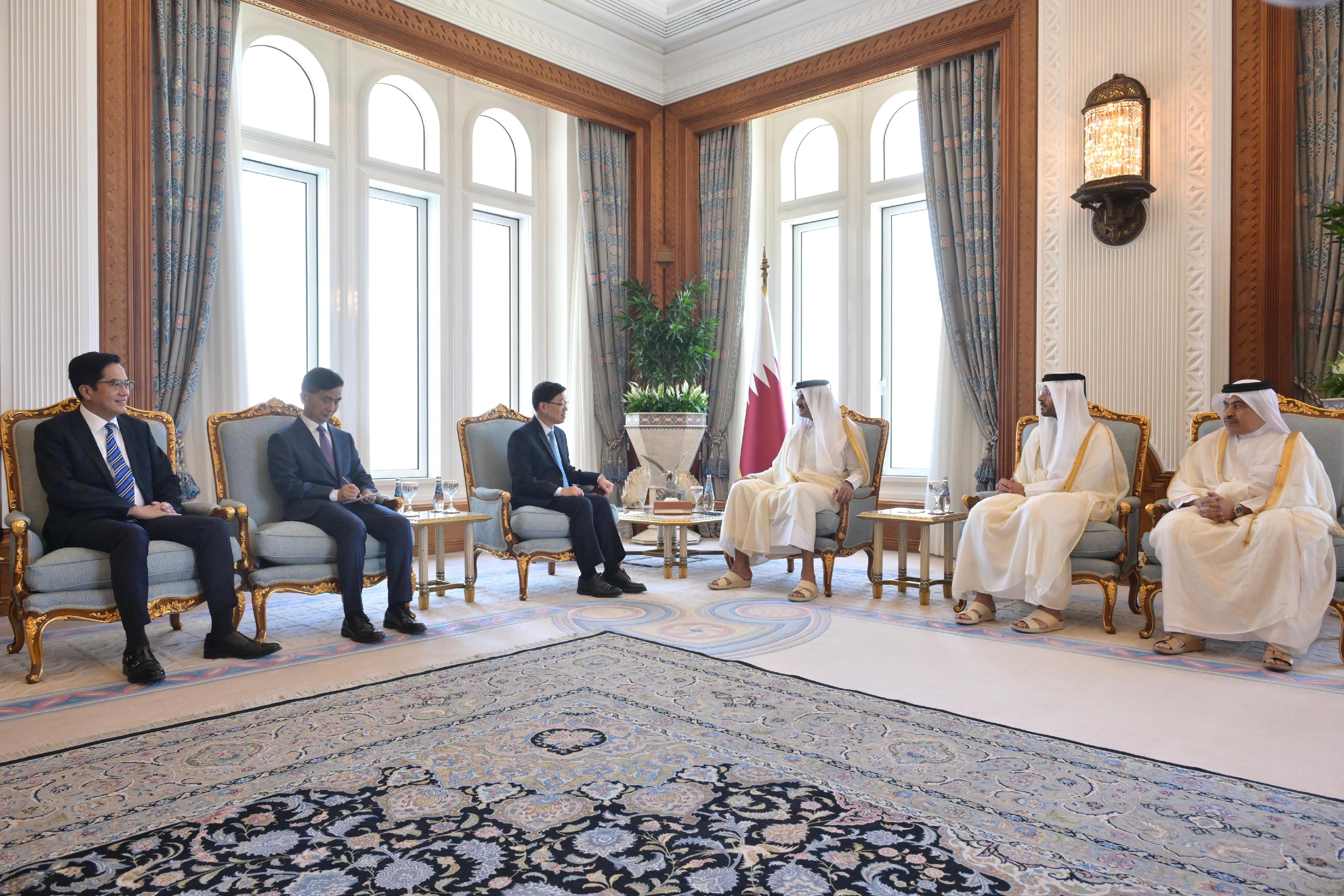 The Chief Executive, Mr John Lee (third left), meets with the Amir (head of state) of Qatar, Mr Tamim bin Hamad Al Thani (third right), in Qatar, today (May 11).