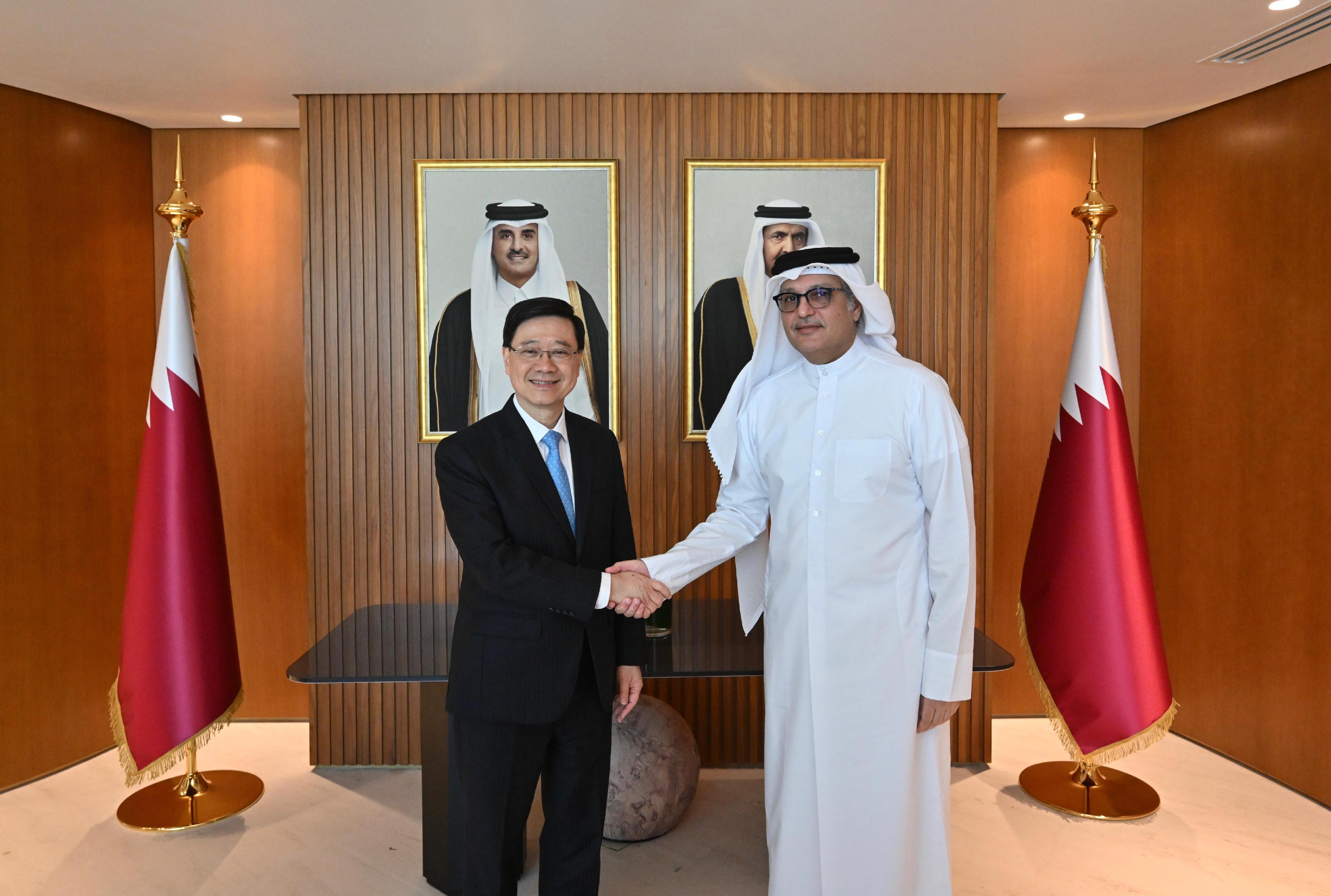 The Chief Executive, Mr John Lee (left), meets with the Minister of Communications and Information Technology of Qatar, Mr Mohammed bin Ali bin Mohammed Al Mannai (right), in Qatar, today (May 11).