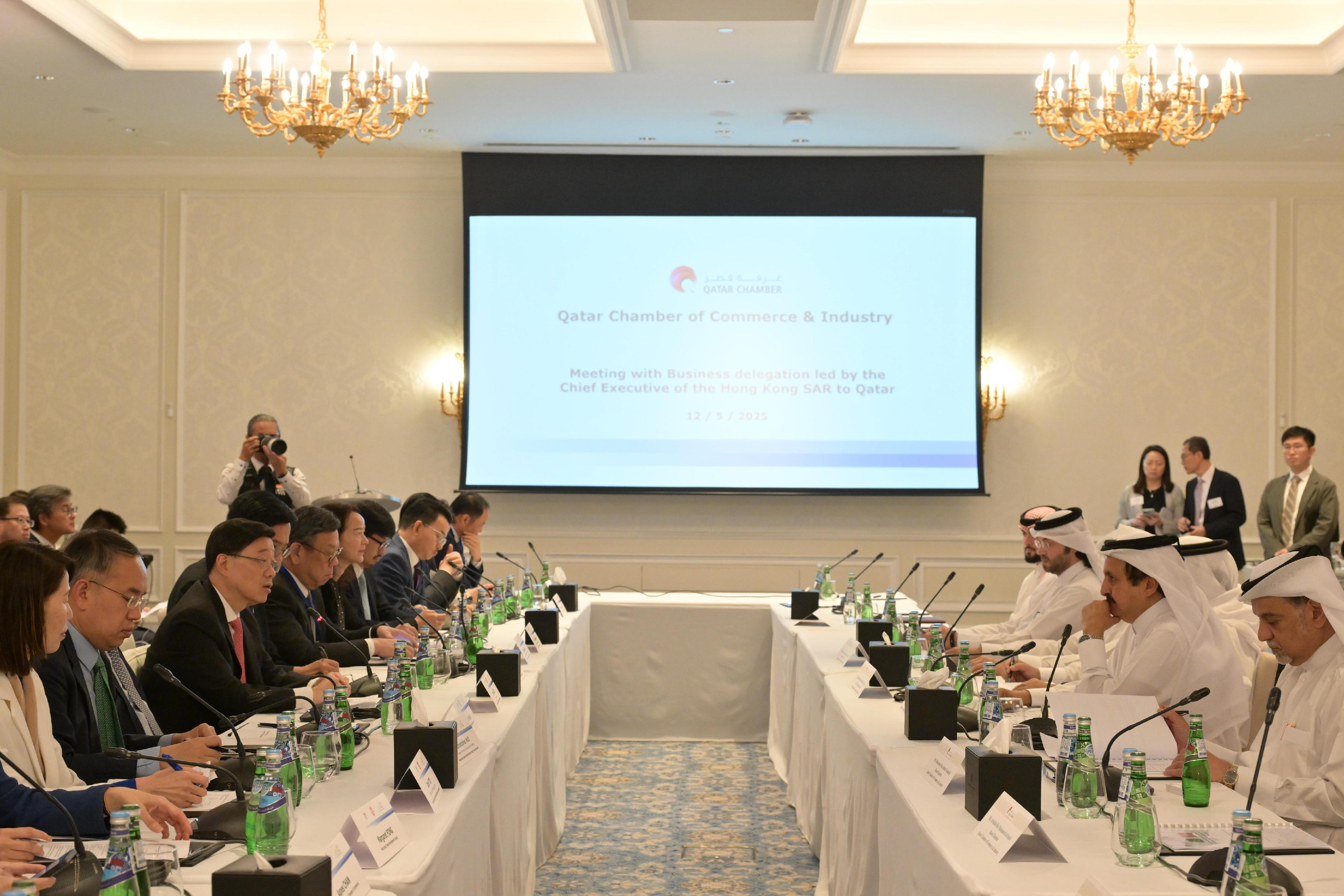 The Chief Executive, Mr John Lee (third left), attends a roundtable meeting with Qatar Chamber of Commerce and Industry in Qatar today (May 12).