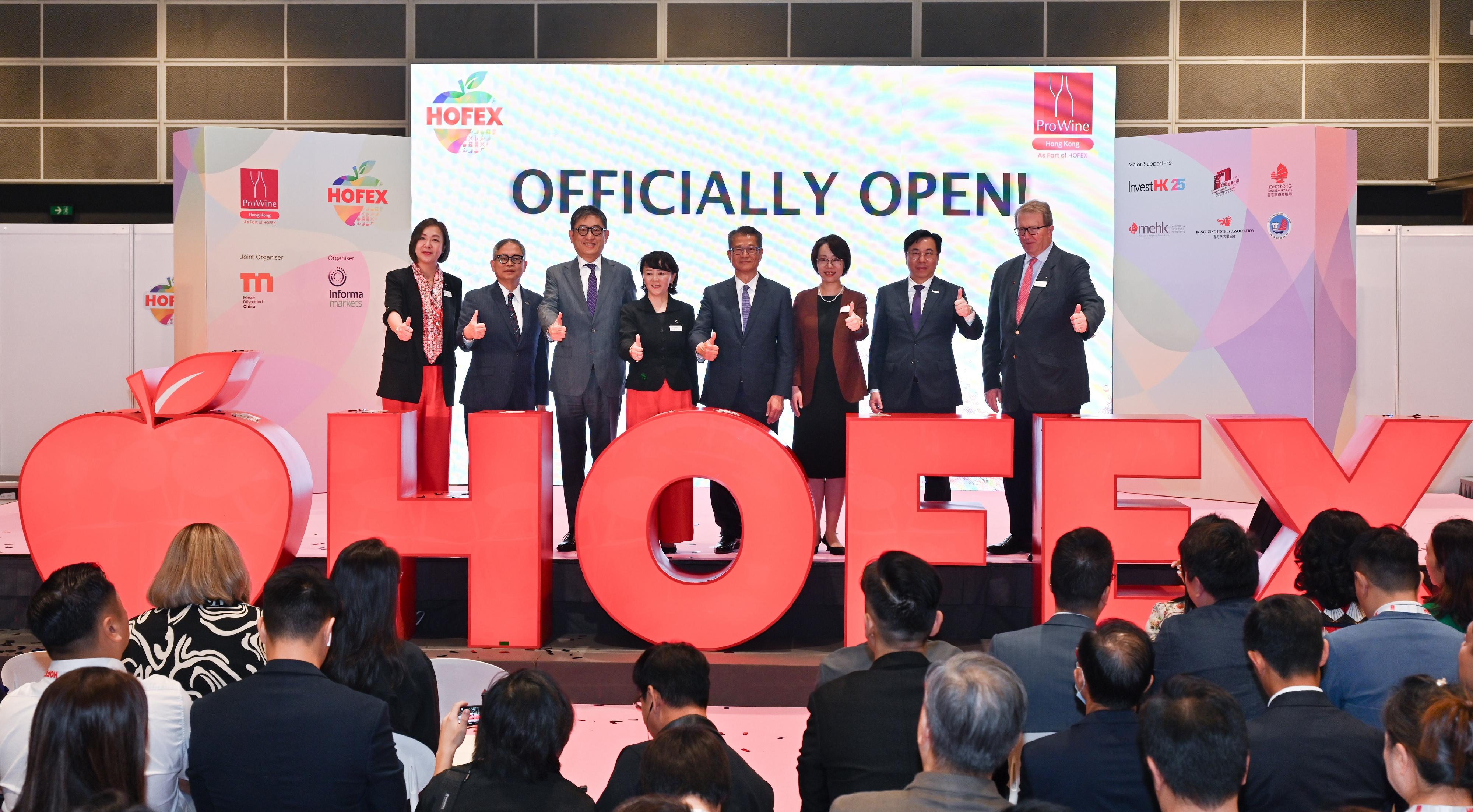 The Financial Secretary, Mr Paul Chan, attended the HOFEX and ProWine Hong Kong @ HOFEX Opening Ceremony today (May 14). Photo shows (from third left) the Executive Director of the Hong Kong Tourism Board, Mr Dane Cheng; the President and Chief Executive Officer of Informa Markets in Asia, Ms Margaret Ma Connolly; Mr Chan, and other guests officiating at the ceremony.