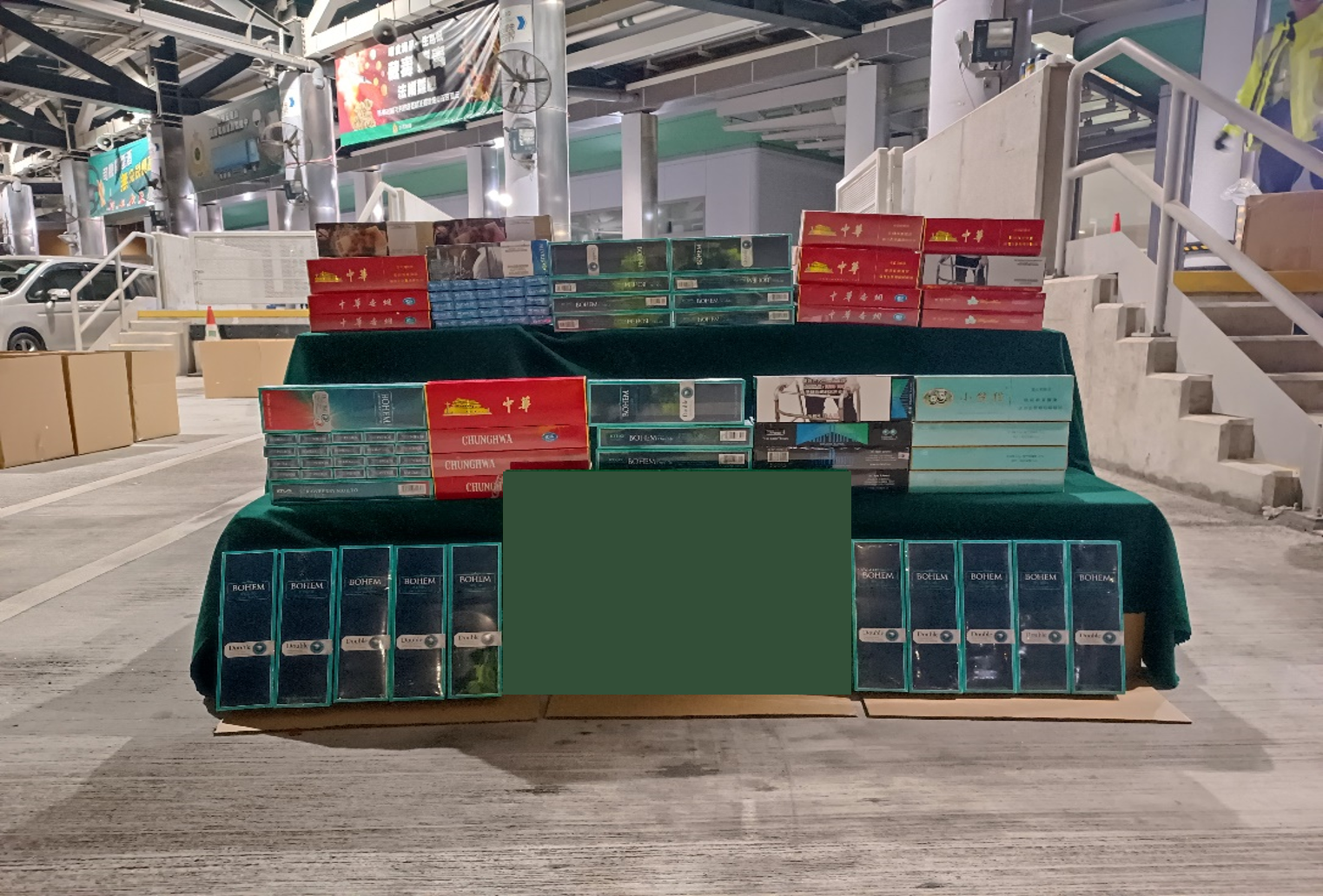A 49-year-old incoming male driver was sentenced to four months' imprisonment and fined $1,000 at the West Kowloon Magistrates' Courts today (May 15) for importing duty-not-paid cigarettes and failing to declare them to Customs officers, in contravention of the Dutiable Commodities Ordinance. Photo shows the duty-not-paid cigarettes seized.
