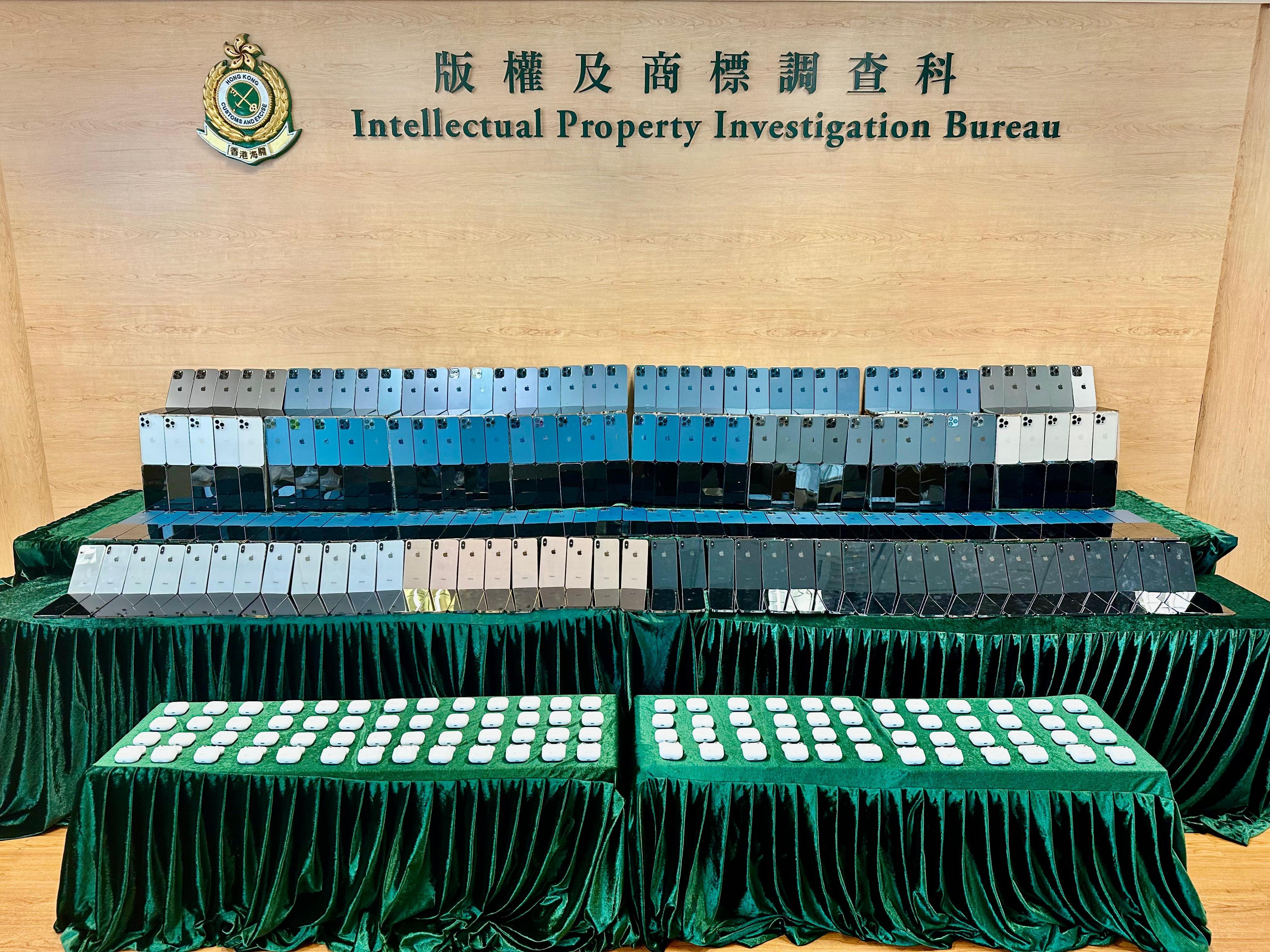 Hong Kong Customs conducted an enforcement operation on May 13 and 15 to combat the sale of counterfeit goods in Kwun Tong and Sham Shui Po, and seized a total of about 3 300 suspected counterfeit mobile phones and accessories with a total estimated market value of about $4.25 million. Photo shows some of the suspected counterfeit mobile phones and accessories seized.