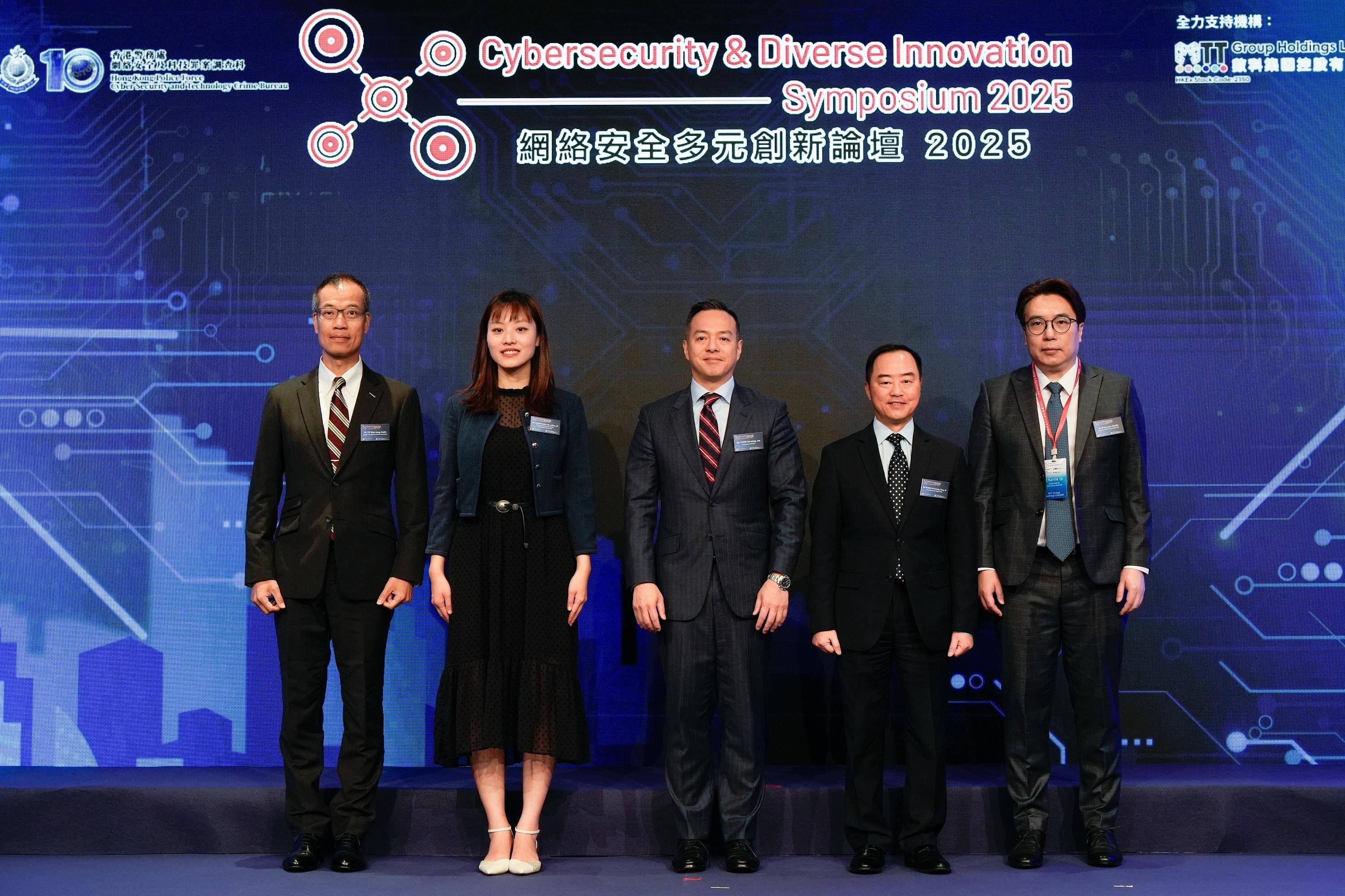 Jointly organised by the Cyber Security and Technology Crime Bureau of the Hong Kong Police Force and the Digital Policy Office, the Cybersecurity & Diverse Innovation Symposium 2025 was held today (May 16) at the Hong Kong Convention and Exhibition Centre. Photo shows (from left) the Deputy Commissioner of Police (Operations), Mr Yip Wan-lung; the Under Secretary for Innovation, Technology and Industry, Ms Lillian Cheong; the Commissioner of Police, Mr Chow Yat-ming; the Commissioner for Digital Policy, Mr Tony Wong, and the founder of MTT Group Holdings Limited, Mr Ip Ka-wai, officiating at the opening ceremony.
