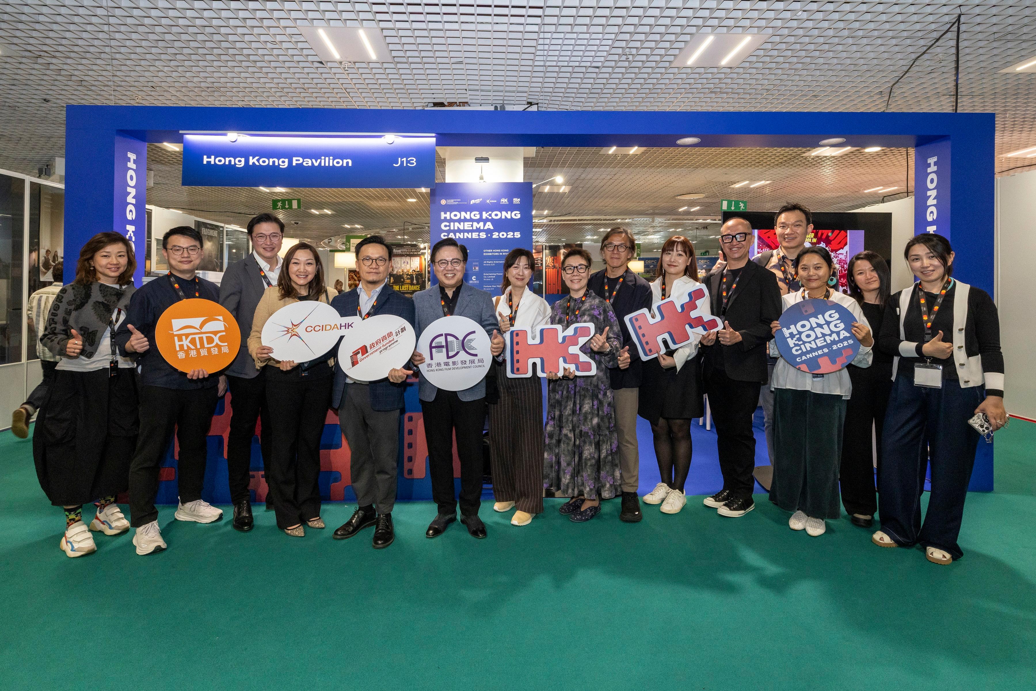 The Cultural and Creative Industries Development Agency under the Culture, Sports and Tourism Bureau and the Hong Kong Film Development Council (FDC) led an industry delegation to participate in the 78th Cannes Film Festival in France. Photo shows Assistant Commissioner for Cultural and Creative Industries and Secretary-General of the FDC, Mr Gary Mak (fifth left); and the Chairman of the FDC, Dr Wilfred Wong (sixth left), and other industry representatives at the opening ceremony of the Hong Kong Pavilion at the Cannes Film Market on May 15 (Cannes time).