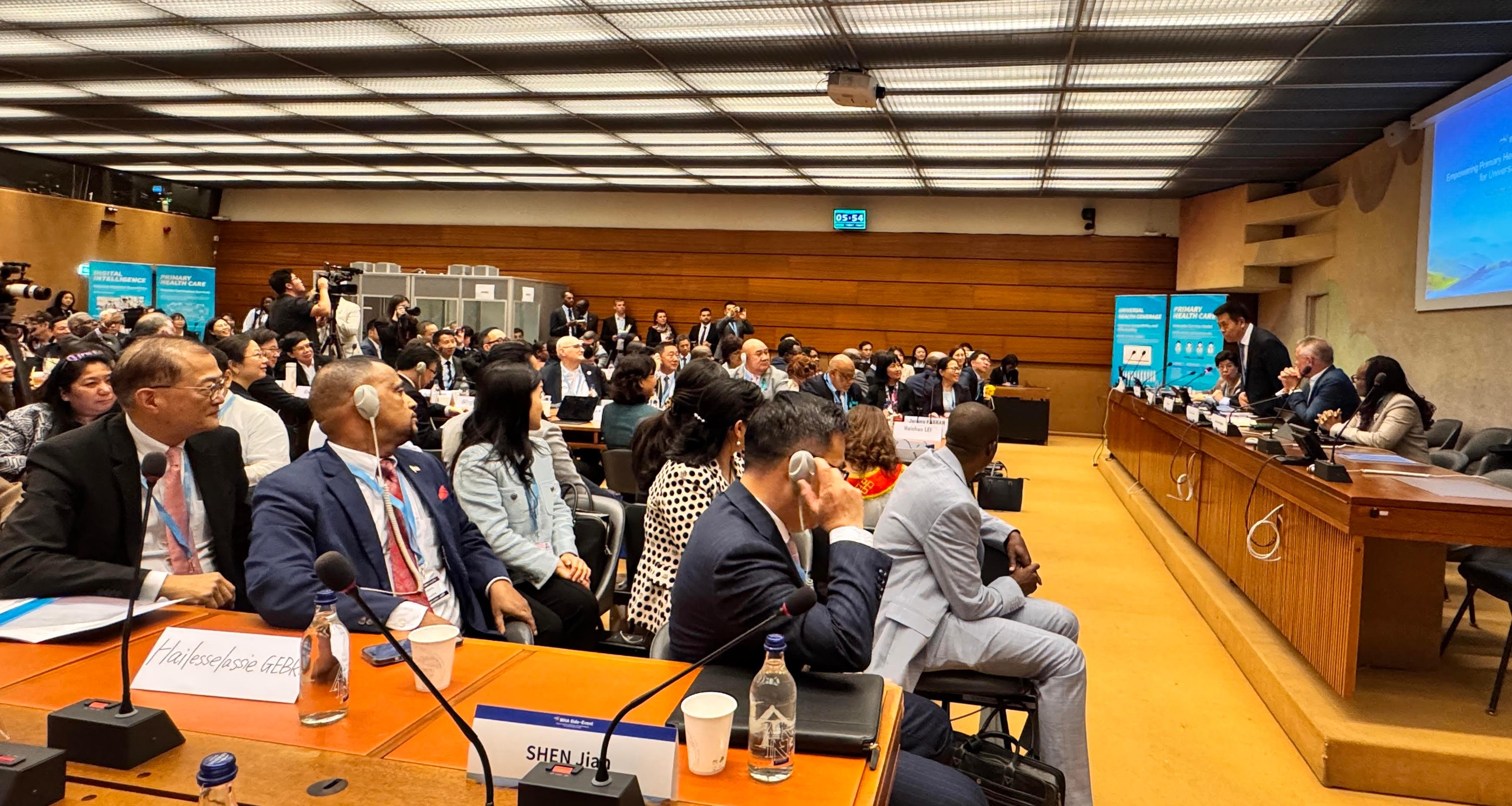 The Secretary for Health, Professor Lo Chung-mau, and the Director of Health, Dr Ronald Lam, attended the 78th World Health Assembly of the World Health Organization as members of the Chinese delegation in Geneva, Switzerland, and also attended the thematic side event "Empowering Primary Health Care with Digital Intelligence for Universal Health Coverage" cohosted by the National Health Commission (NHC) and health authorities of Ethiopia, Peru, Tanzania and Thailand yesterday evening (May 19, Geneva time). Photo shows Professor Lo (first left) listening to the keynote speech delivered by the Minister of the NHC, Mr Lei Haichao, at the side event.

