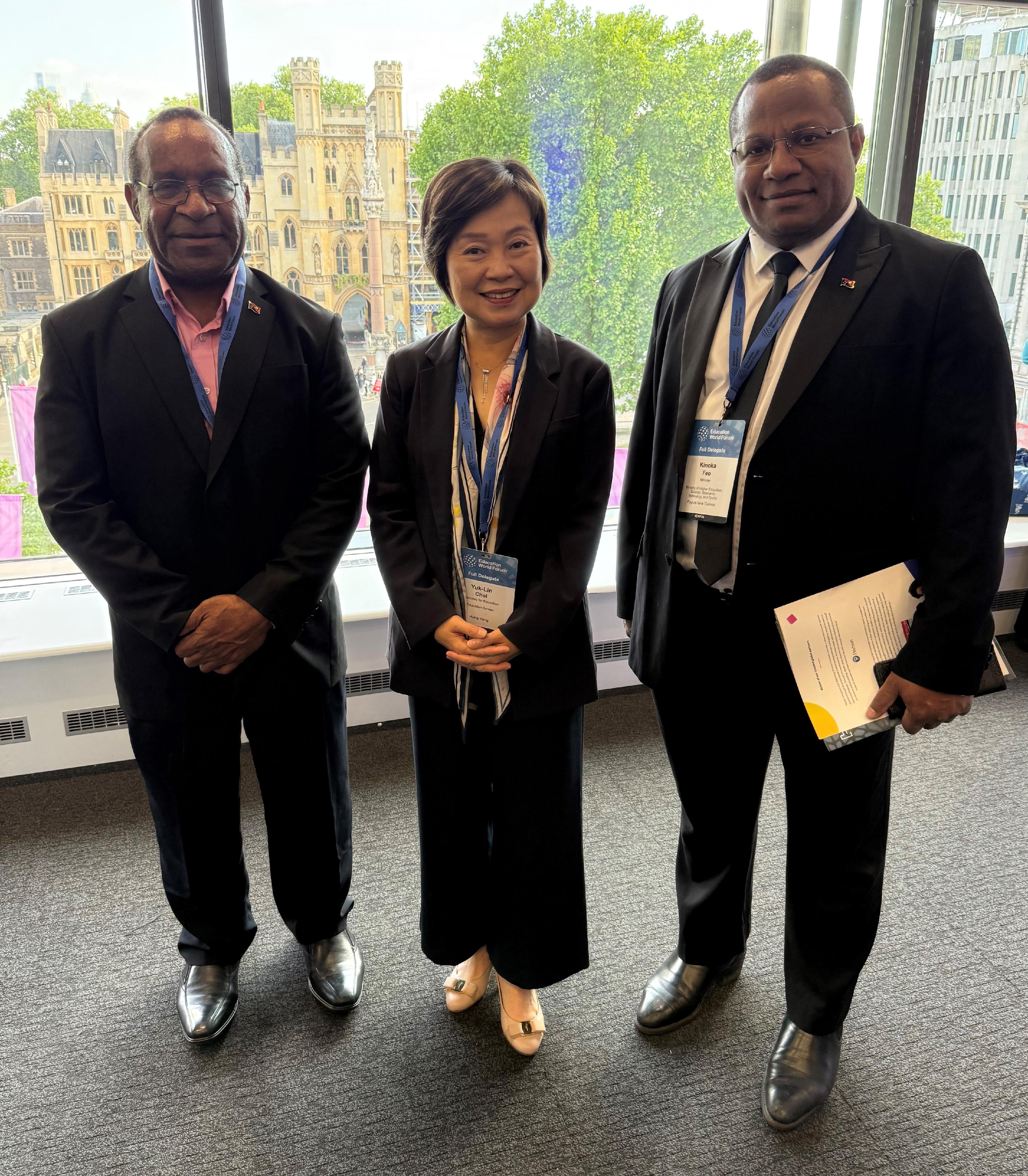 The Secretary for Education, Dr Choi Yuk-lin, attended the Education World Forum 2025 in London, the United Kingdom, on May 19 (London time). Photo shows Dr Choi (centre), the Minister for Education of Papua New Guinea, Mr Lucas Dawa Dekena (left), and the Minister for Higher Education, Research, Science, Technology and Sports of Papua New Guinea, Mr Kinoka Feo (right).