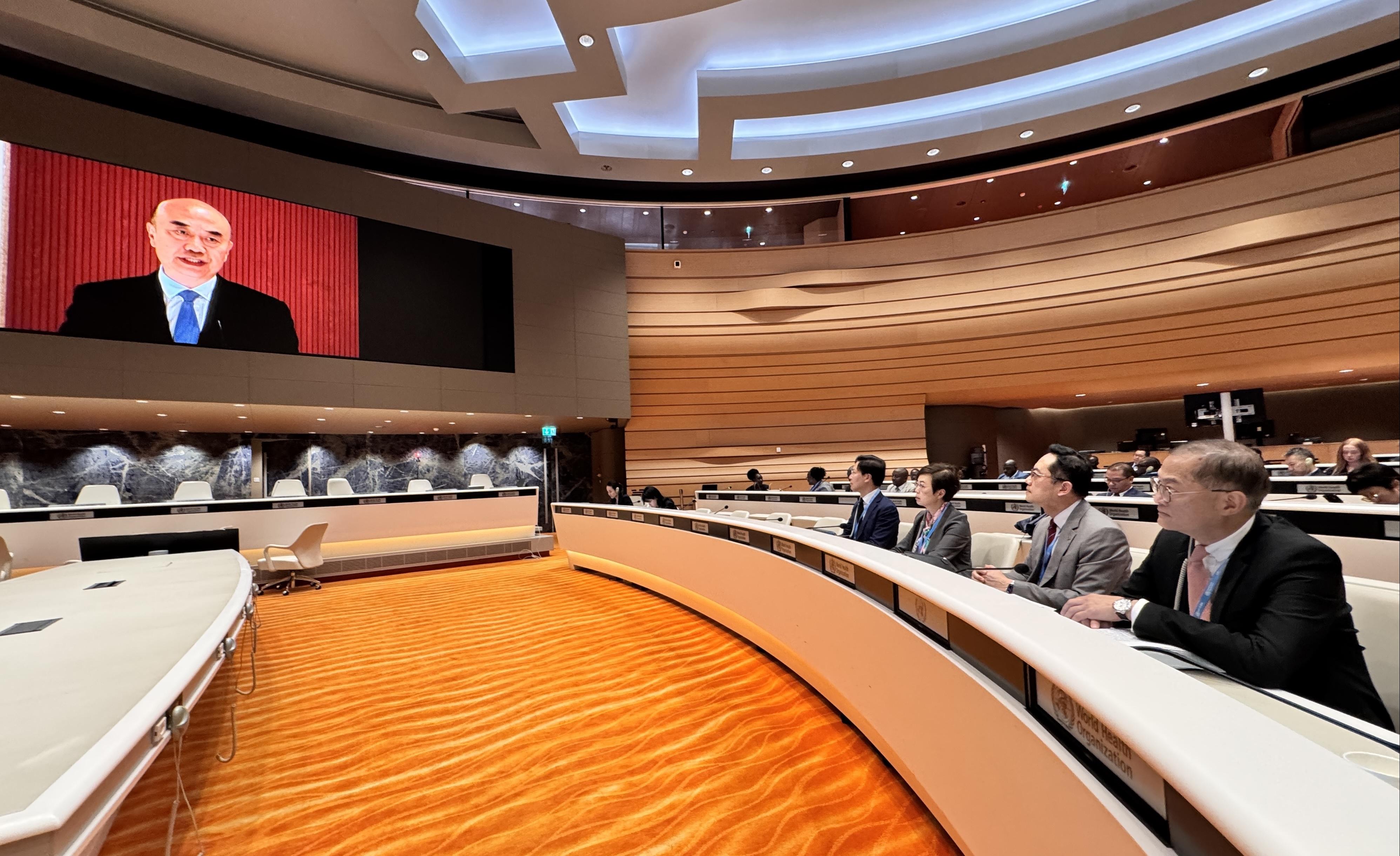 The Secretary for Health, Professor Lo Chung-mau (first right) and the Director of Health, Dr Ronald Lam (second right) continued to attend the 78th World Health Assembly of the World Health Organization yesterday (May 20, Geneva time) as members of the Chinese delegation in Geneva, Switzerland, and listened to Vice Premier of the State Council Mr Liu Guozhong's remarks made at the High Level Segment.