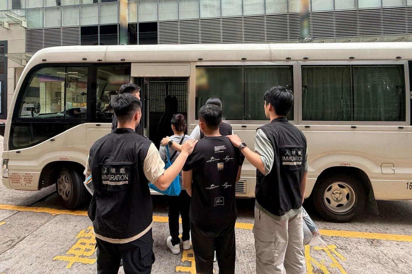 The Immigration Department mounted a series of territory-wide anti-illegal worker operations codenamed "Fastrack", "Lightshadow", "Twilight", and a joint operation with the Hong Kong Police Force codenamed "Champion", for four consecutive days from May 19 to yesterday (May 22). Photo shows suspected illegal workers arrested during an operation.
