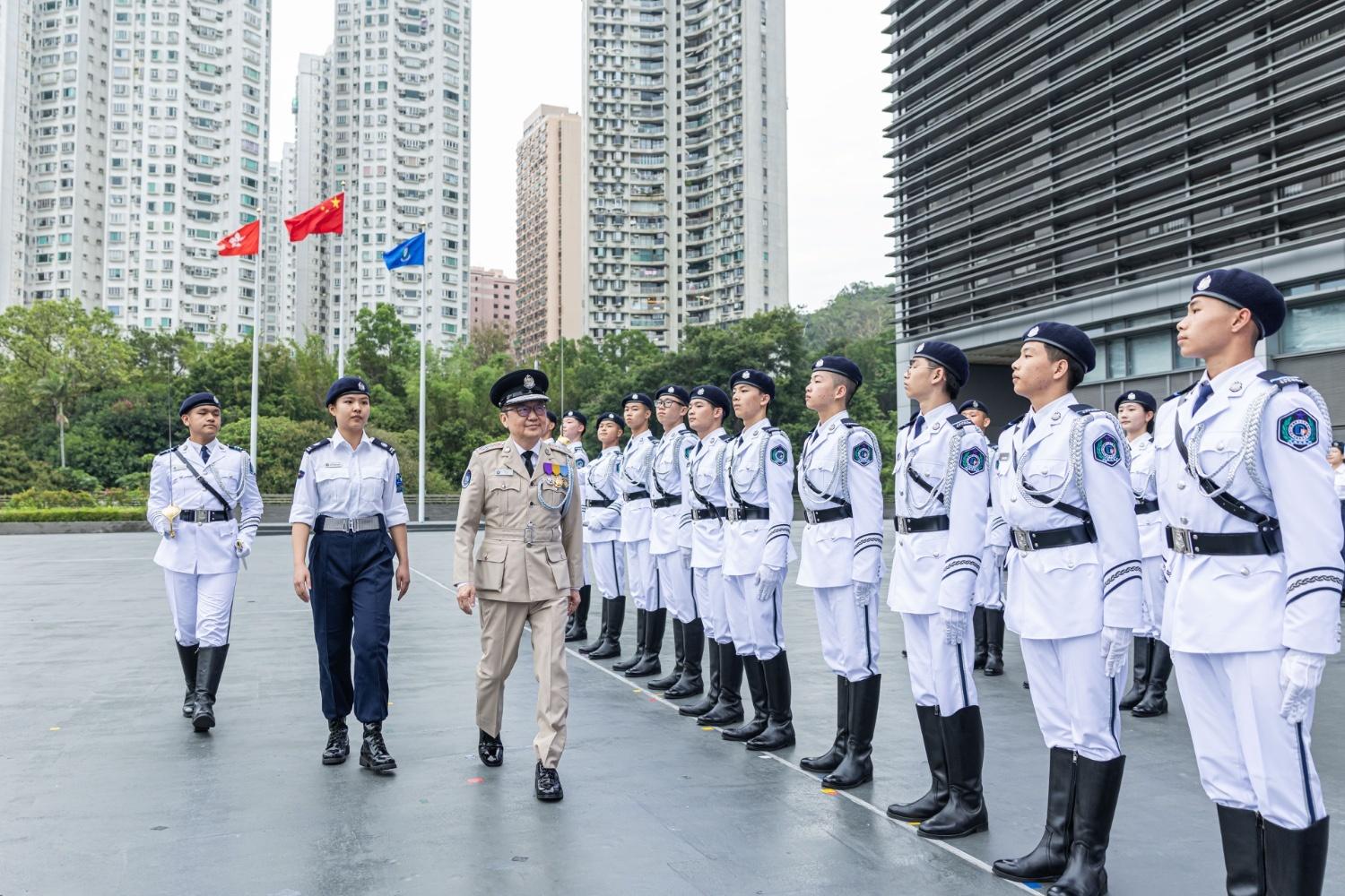The Immigration Department held the Grand Immigration Department Youth Leaders Corps (IDYL) Parade cum Promotion Ceremony 2025 at the Immigration Service Institute of Training and Development in Tuen Mun today (May 25). Photo shows the Commissioner of IDYL, Dr Cheng Kam-chung, reviewing IDYL members. 
