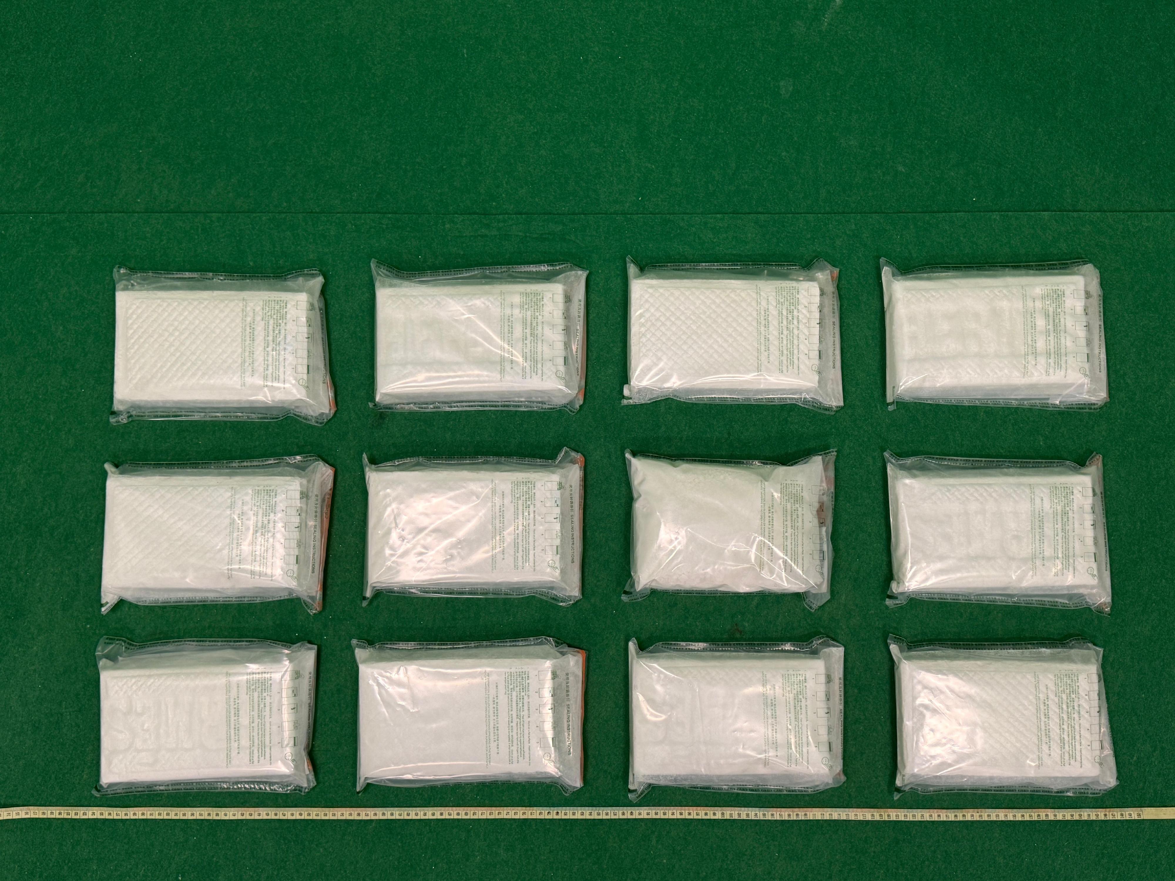 Hong Kong Customs today (May 25) detected a drug trafficking case involving an incoming passenger at Hong Kong International Airport and seized about 12 kilograms of suspected cocaine with an estimated market value of about $9.5 million. Photo shows the suspected dangerous drugs seized. 