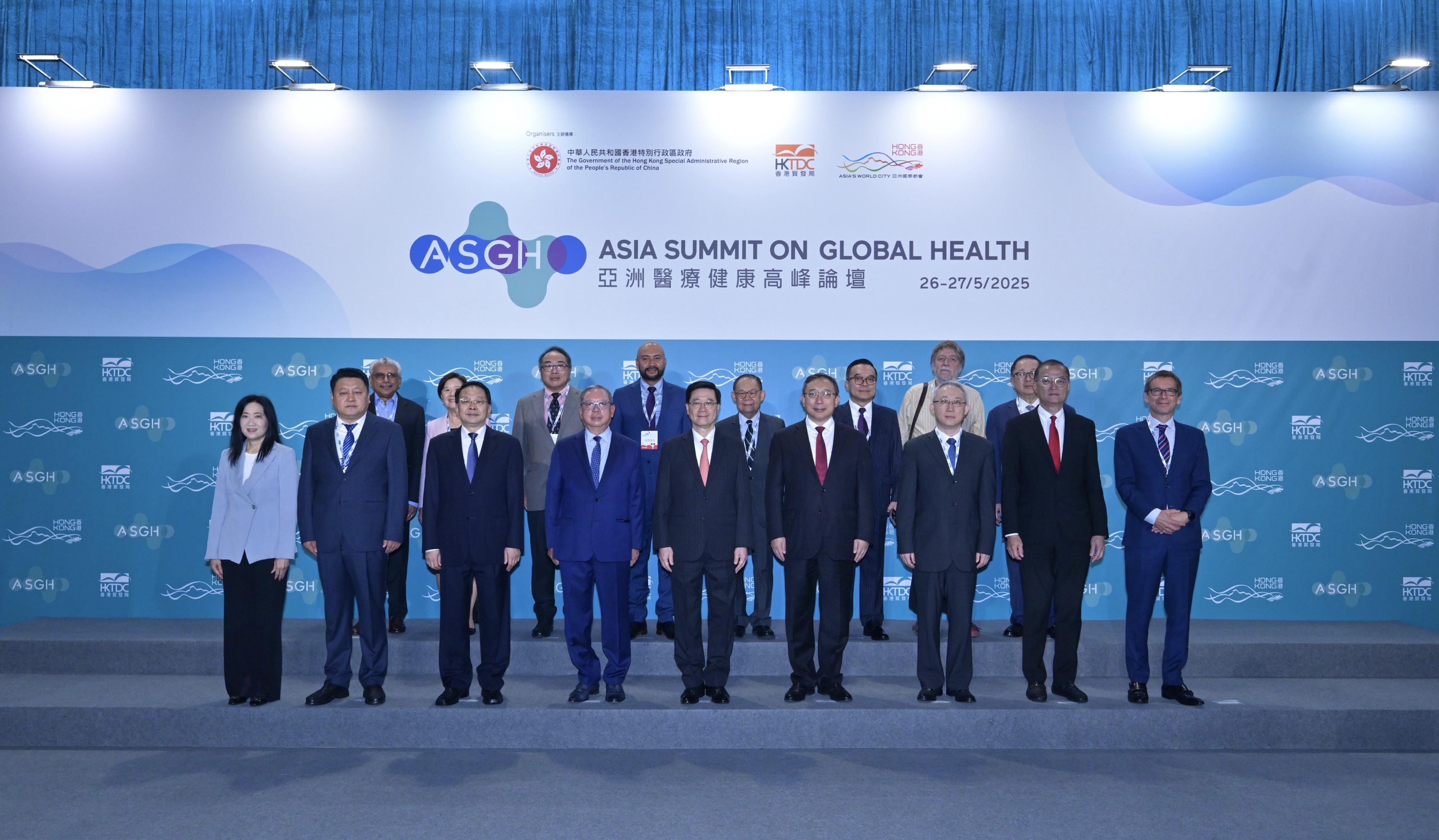 The Chief Executive, Mr John Lee, attended the Asia Summit on Global Health today (May 26). Photo shows (front row, from third left) Deputy Director of the Liaison Office of the Central People's Government in the Hong Kong Special Administrative Region (HKSAR) Mr Yin Zonghua; the Chairman of the Hong Kong Trade Development Council, Dr Peter Lam; Mr Lee; Vice-minister of the National Health Commission Mr Cao Xuetao; Deputy Commissioner of the Office of the Commissioner of the Ministry of Foreign Affairs of the People's Republic of China in the HKSAR Mr Li Yongsheng; the Secretary for Health, Professor Lo Chung-mau, and other guests at the event.