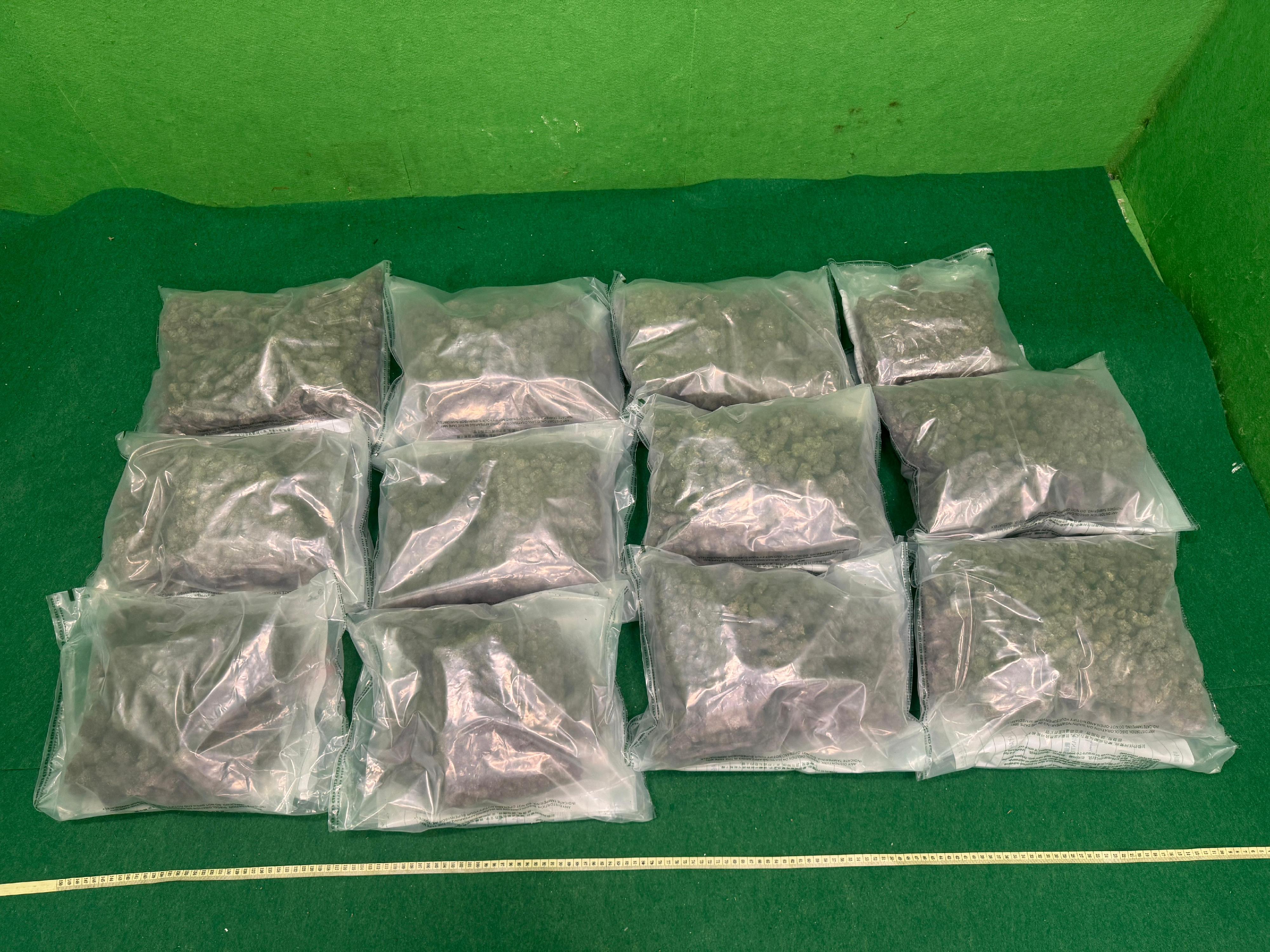 Hong Kong Customs yesterday (May 27) and today (May 28) detected two drug trafficking cases involving baggage concealment at Hong Kong International Airport and seized about 6 kilograms of suspected methamphetamine and about 12kg  of suspected cannabis buds with a total estimated market value of about $5.6 million. Photo shows the suspected cannabis buds seized.
