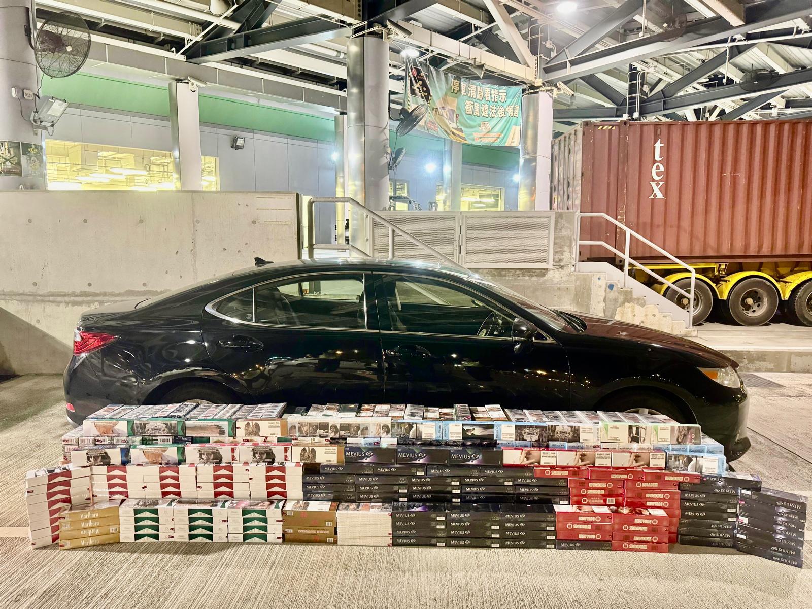 A 58-year-old man was sentenced to eight months' imprisonment at the West Kowloon Magistrates' Courts today (May 30) for importing duty-not-paid cigarettes, in contravention of the Dutiable Commodities Ordinance. Photo shows the suspected duty-not-paid cigarettes seized by Customs officers from the man's private car.