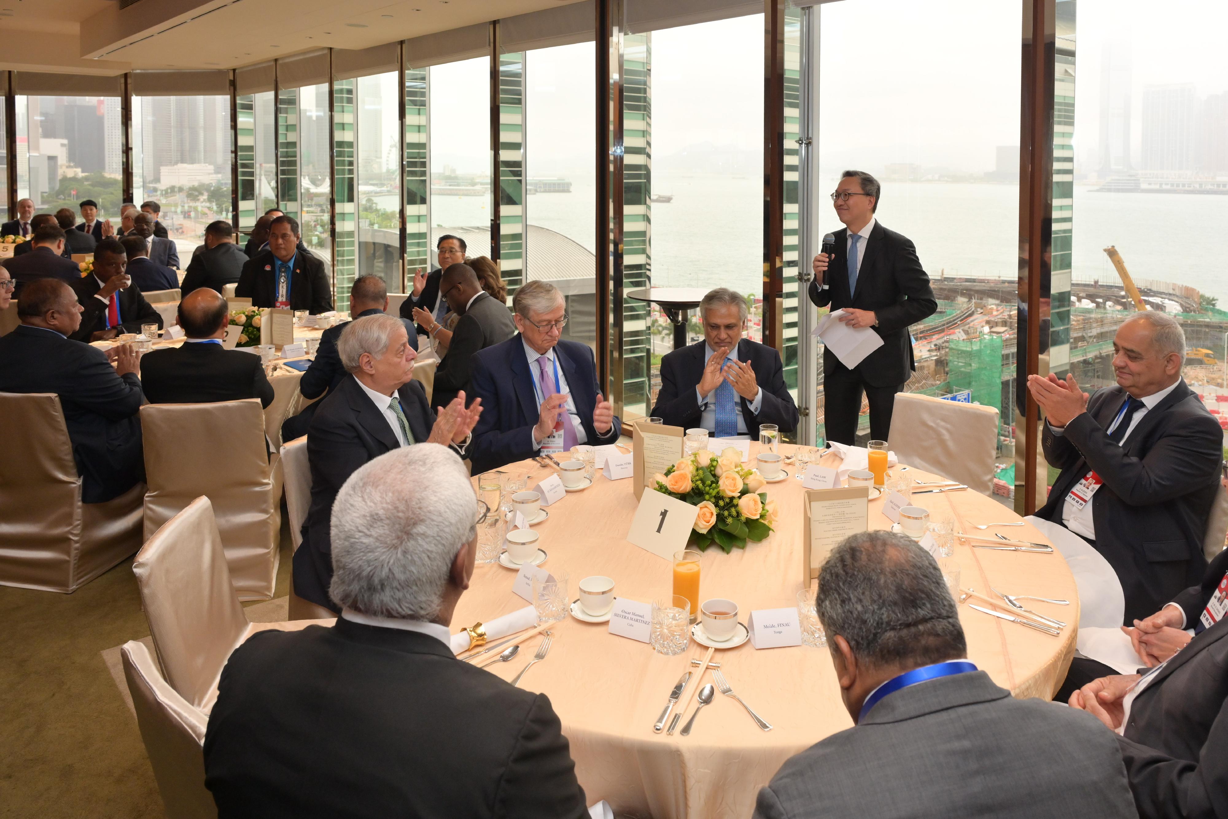 The Signing Ceremony of the Convention on the Establishment of the International Organization for Mediation and the Global Forum on International Mediation successfully concluded in Hong Kong today (May 30). Photo shows the Secretary for Justice, Mr Paul Lam, SC (second right), speaking at the luncheon of the ceremony and forum.