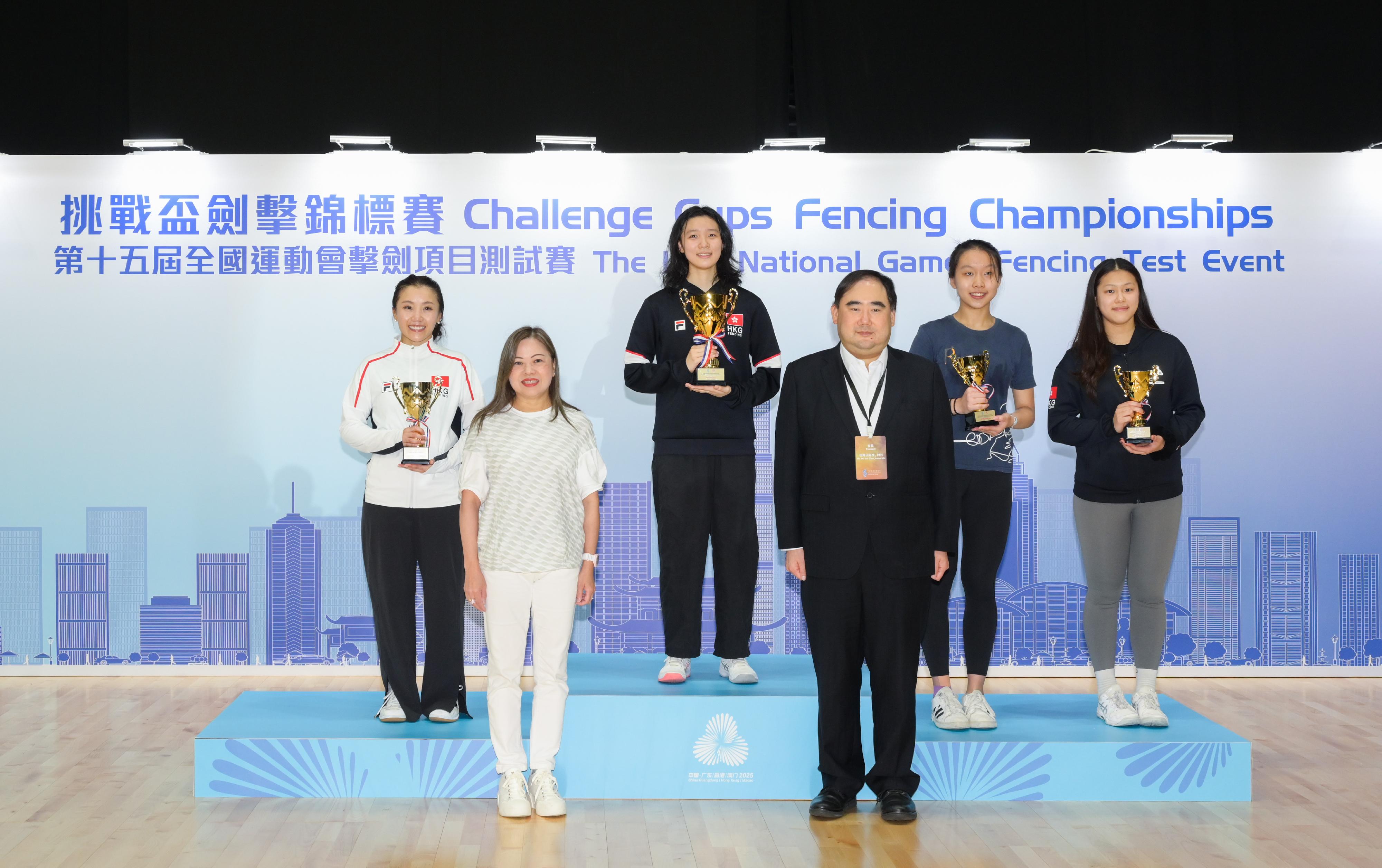 The 15th National Games Fencing test event was held at Kai Tak Arena, Kai Tak Sports Park on May 31. Photo shows the Secretary for Culture, Sports and Tourism, Miss Rosanna Law (front row, left), and the President of the Fencing Association of Hong Kong, China, Mr Aaron Ng (front row, right), presenting awards to the winners of the women's épée competition.