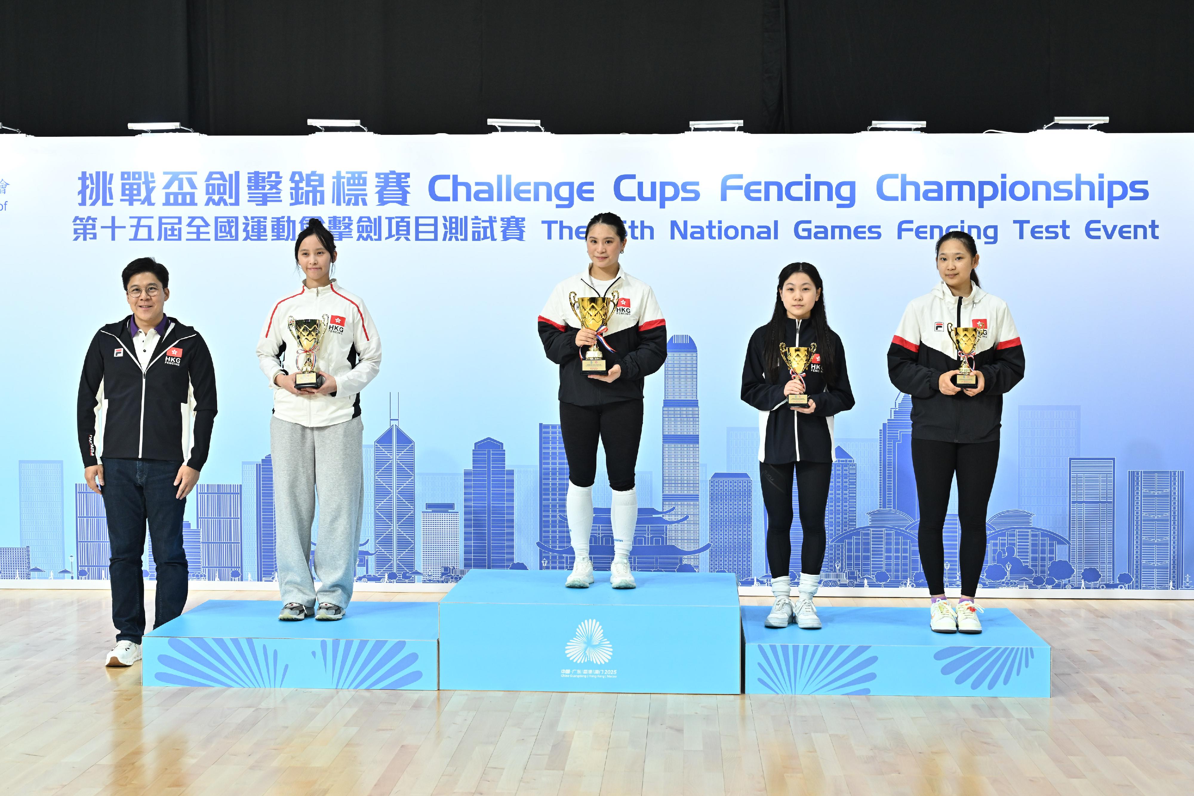 The 15th National Games Fencing test event concluded at Kai Tak Arena, Kai Tak Sports Park today (June 1). Photo shows the champion of women's foil competition, Janelle Leung (centre) and other winners.
