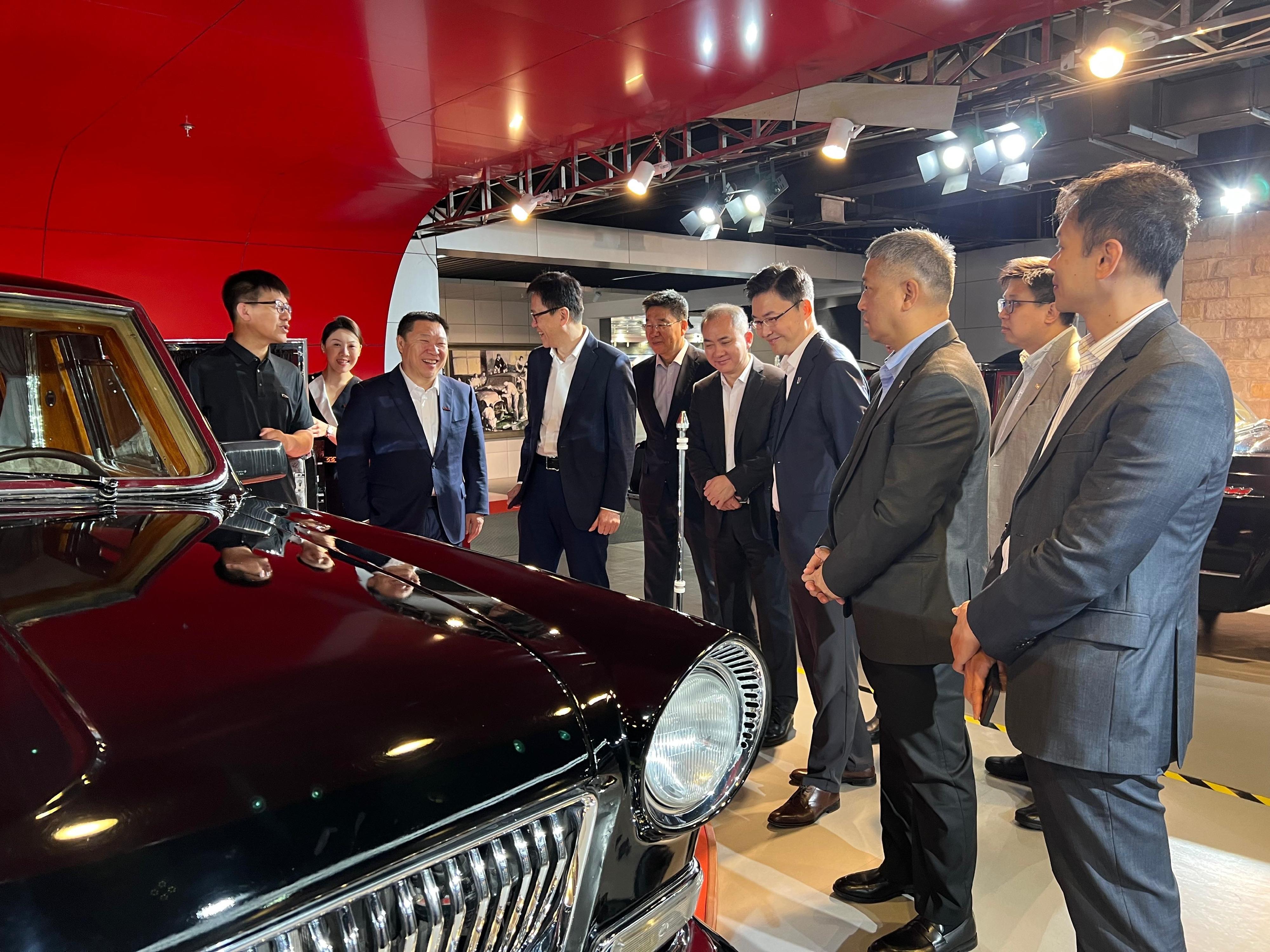 The Secretary for Innovation, Technology and Industry, Professor Sun Dong (fourth left), toured the China FAW Group Corporation and its Cultural Exhibition Hall in Changchun today (June 4) to learn about the development of the advanced manufacturing industry there. Looking on is the Commissioner for Industry (Innovation and Technology), Dr Ge Ming (sixth left).