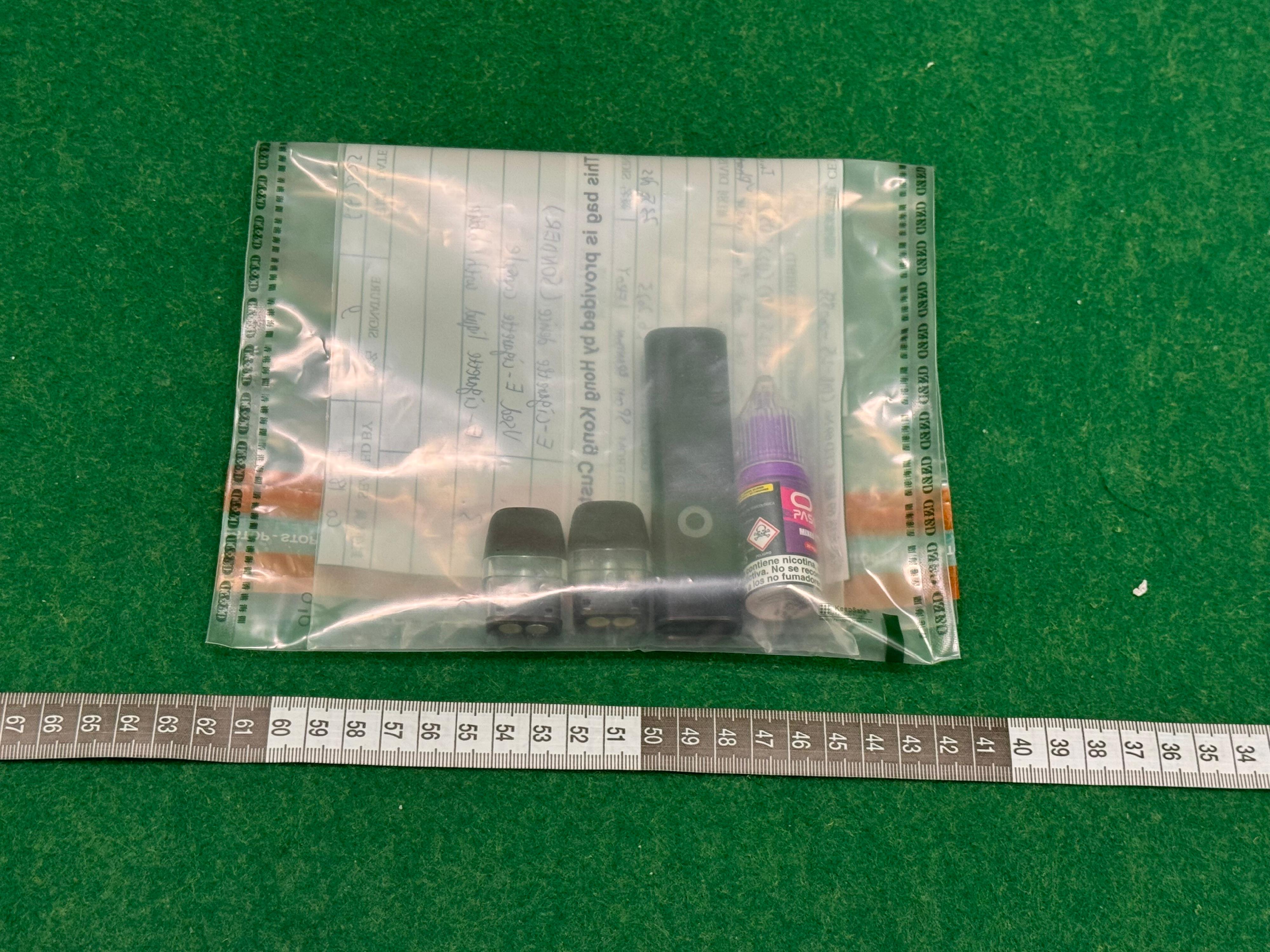 Hong Kong Customs yesterday (June 5) detected two drug trafficking cases involving baggage concealment at Hong Kong International Airport. Photo shows the suspected alternative smoking products seized in the second case.

