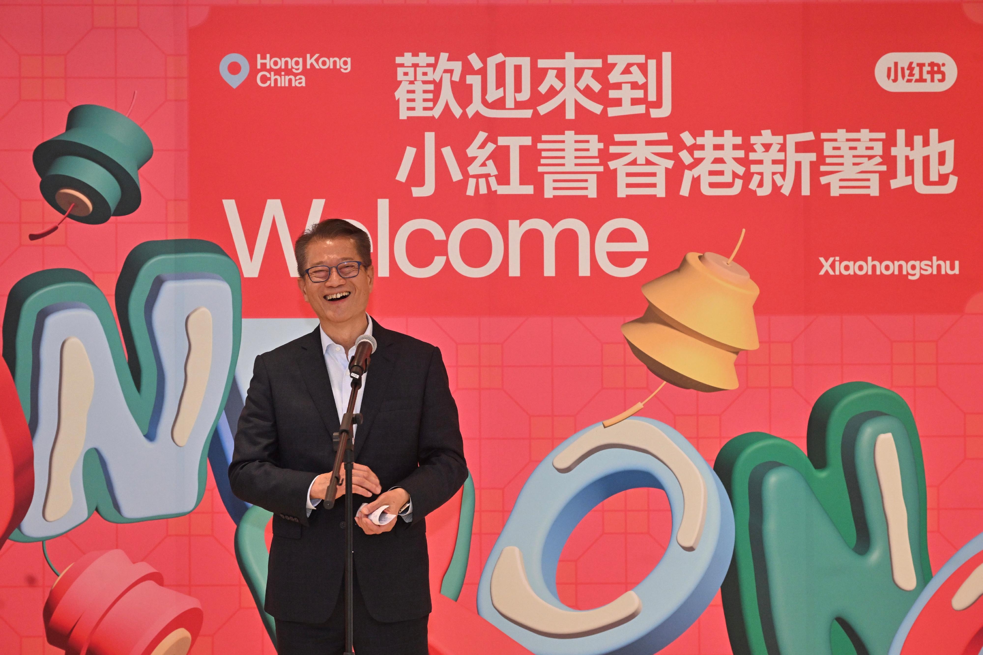 Xiaohongshu held an opening ceremony today (June 7) for its Hong Kong office. Photo shows the Financial Secretary, Mr Paul Chan, officiating the ceremony and delivering a speech.