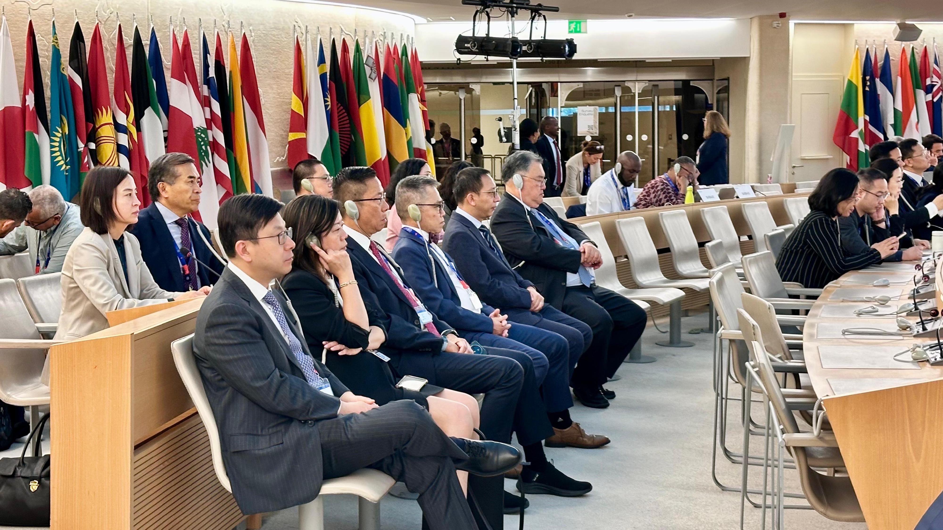 The Secretary for Labour and Welfare, Mr Chris Sun, arrived in Geneva, Switzerland, on June 4 (Geneva time) to attend the 113th Session of the International Labour Conference (ILC). Photo shows Mr Sun (front row, first left) and the Commissioner for Labour, Ms May Chan (front row, second left), as part of the delegation of the People's Republic of China, listening to a speech delivered by Vice Minister of Human Resources and Social Security Mr Wu Xiuzhang, at the plenary session of the ILC on June 6 afternoon (Geneva time).