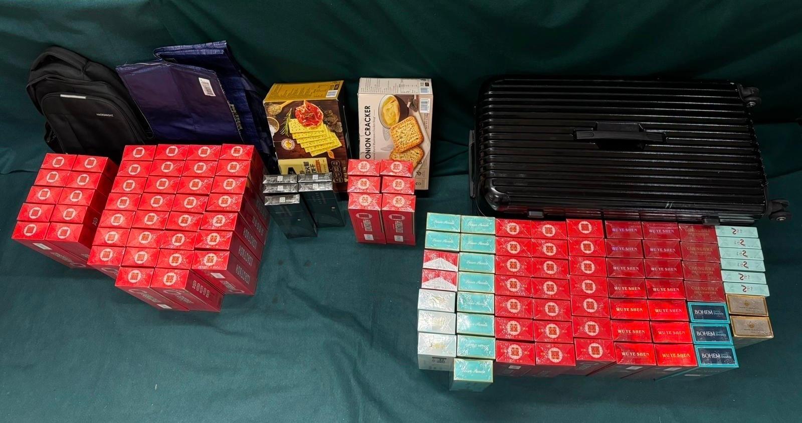 An incoming female passenger was sentenced to four months' imprisonment and fined $2,000 at the Fanling Magistrates' Courts today (June 9) for possessing duty-not-paid cigarettes and failing to declare them to Customs officers, in contravention of the Dutiable Commodities Ordinance. Photo shows the duty-not-paid cigarettes seized.
