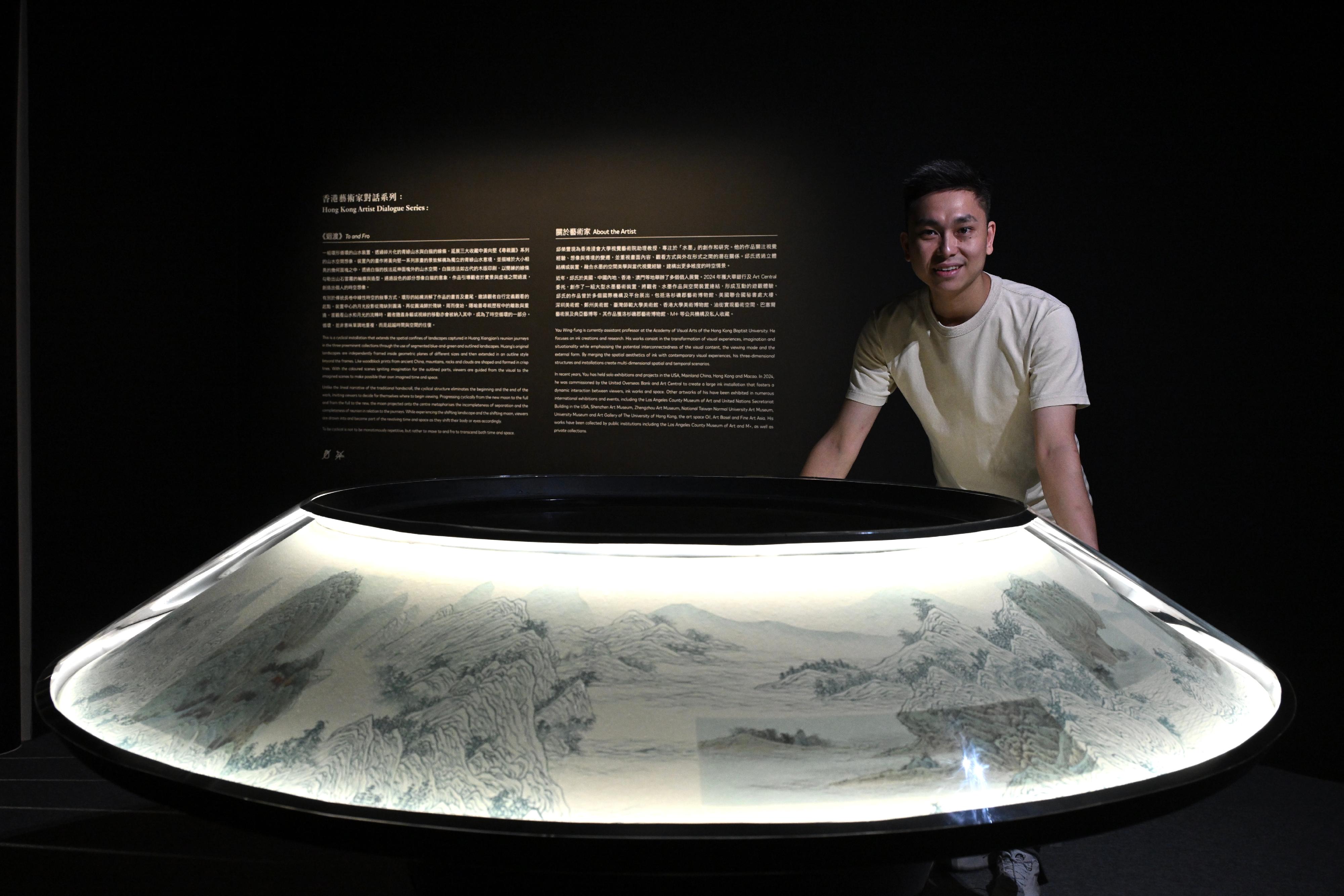 The opening ceremony of the "The Pride of Hong Kong: Three Preeminent Collections of Ancient Paintings and Calligraphies" exhibition was held today (June 10) at the Hong Kong Museum of Art (HKMoA). Photo shows Hong Kong artist Yau Wing-fung and his art installation "To and Fro".
