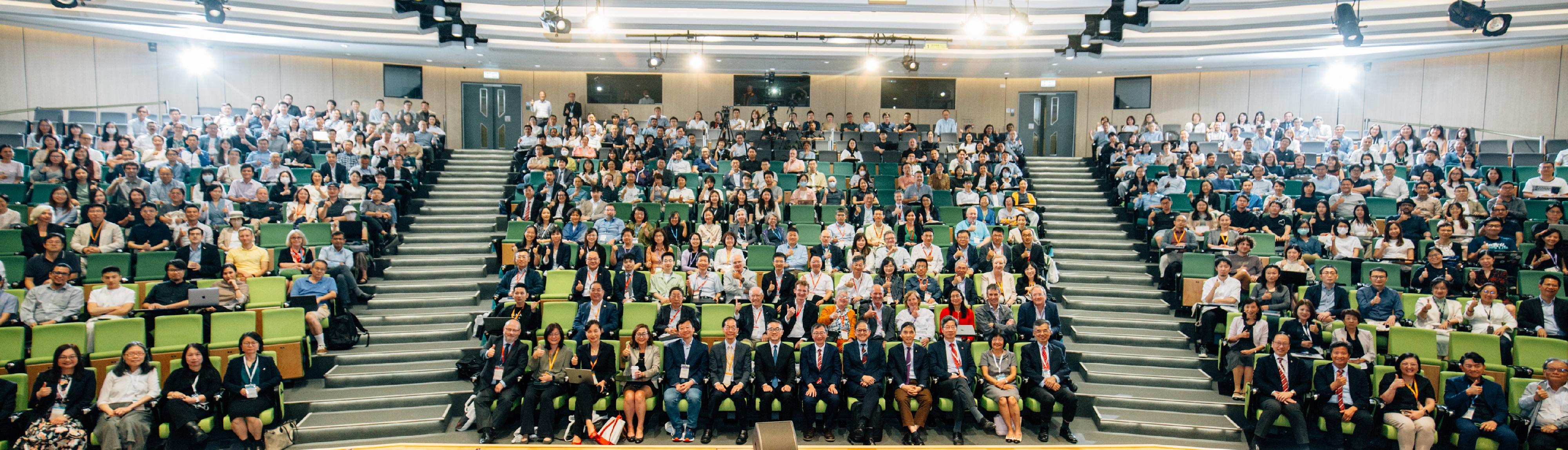 The Acting Secretary for Education, Dr Sze Chun-fai (first row, eleventh left), the Chairman of the Research Grants Council, Professor Timothy W Tong (first row, tenth left), the Secretary-General of the University Grants Committee (UGC), Professor James Tang (first row, tenth right), senior management of the eight UGC-funded universities, and more than 400 local and overseas scholars attend the Research Grants Council Forum 2025 today (June 12).