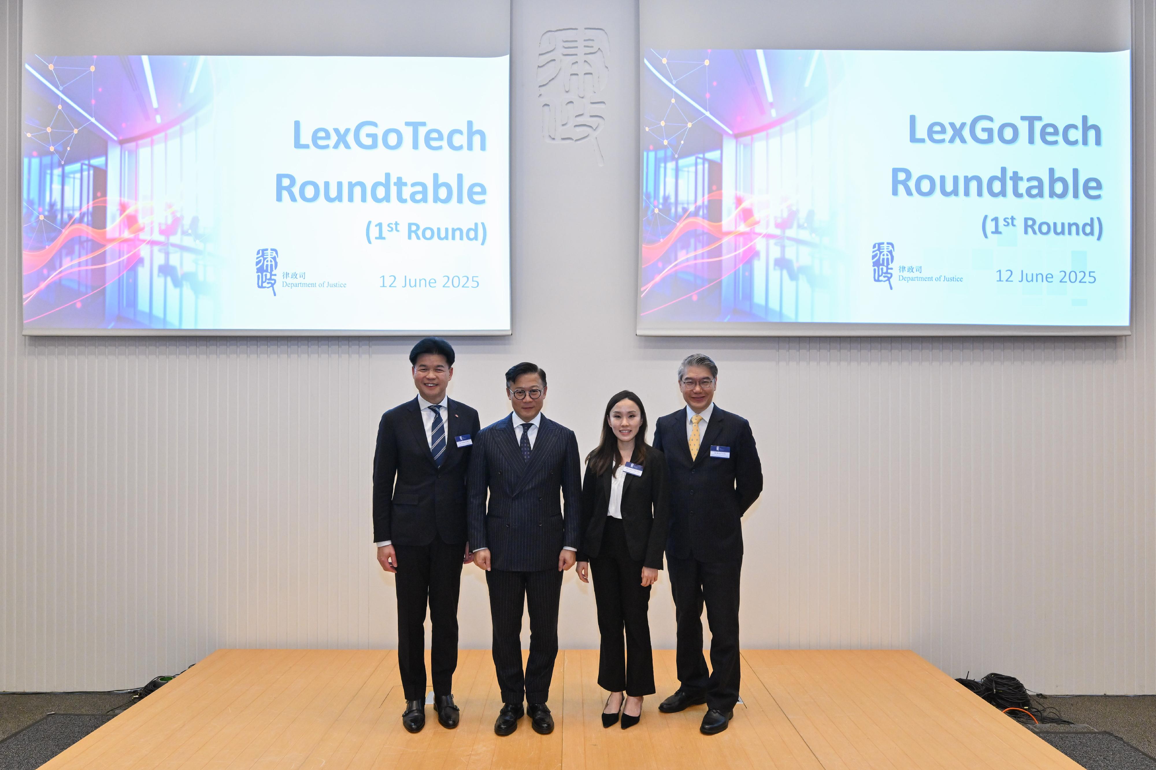 The Department of Justice (DoJ) today (June 12) held the first round of LexGoTech Roundtable. Photo shows (from left) the President of the Law Society of Hong Kong, Mr Roden Tong; the Deputy Secretary for Justice and the Chairman of the Consultation Group on LawTech Development, Dr Cheung Kwok-kwan; the Secretary of the Consultation Group and Principal Government Counsel of the Legal Enhancement and Development Office of the DoJ, Ms Leona Cheung; and Member of the Consultation Group and Executive Director of LITE Lab@HKU of the University of Hong Kong, Mr Brian Tang.
