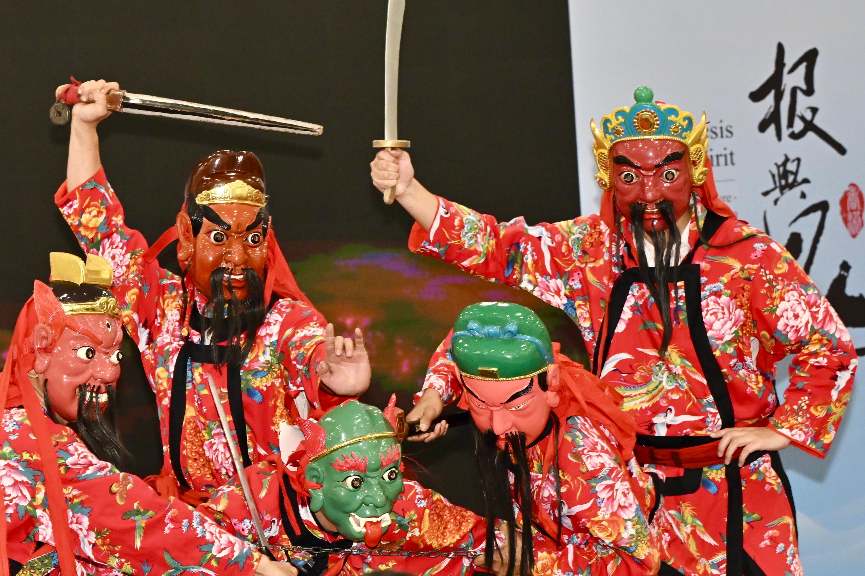 The opening ceremony for "Genesis and Spirit - Treasures of Nature · Extraordinary Hakka: Intangible Cultural Heritage Exhibition of Jiangxi" was held today (June 13) at the Hong Kong Central Library. Photo shows a performance of a representative item of the national intangible cultural heritage, Pingxiang Nuo Dance.