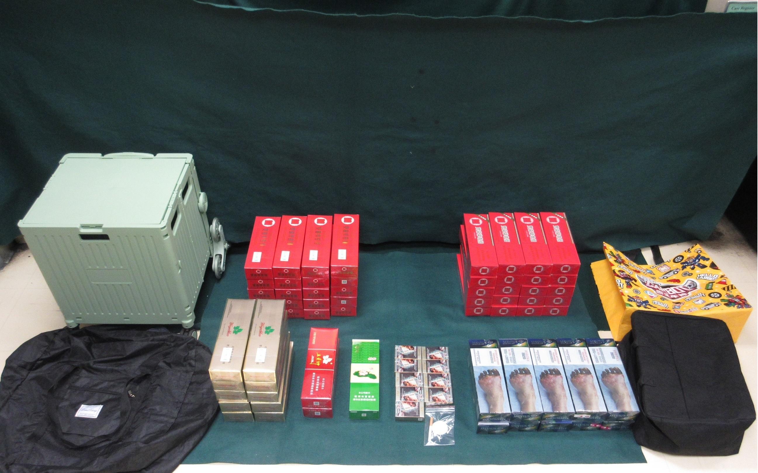 A 34-year-old incoming female passenger was sentenced to four months' imprisonment with a fine of $1,000 at the Fanling Magistrates' Courts today (June 16) for possessing duty-not-paid cigarettes and failing to declare them to Customs Officers at  the Lo Wu Control Point yesterday (June 15), in contravention of the Dutiable Commodities Ordinance. Photo shows the duty-not-paid cigarettes seized.