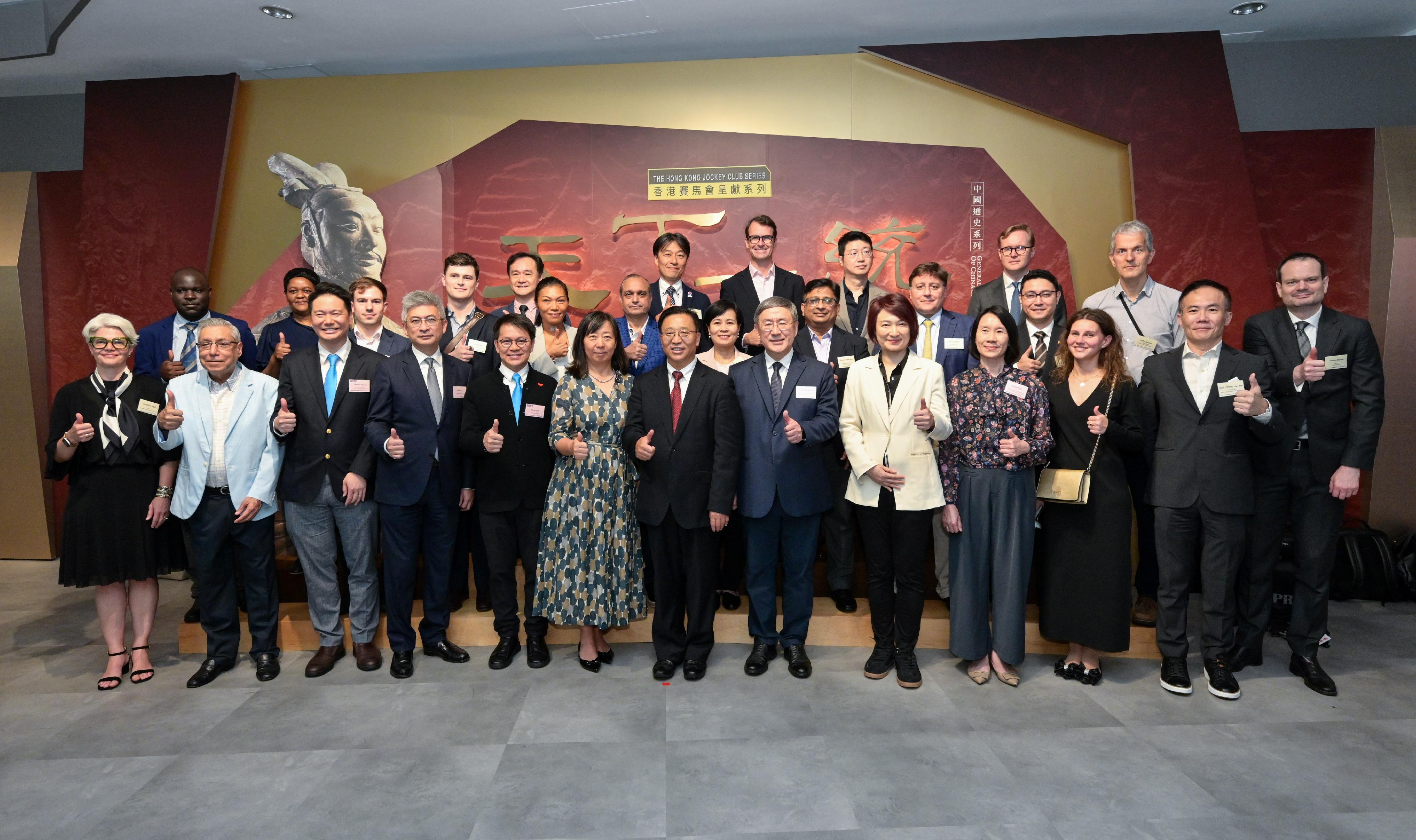 The Deputy Chief Secretary for Administration, Mr Cheuk Wing-hing, attended a session for foreign consular corps and the business community in Hong Kong for “The Great Unity - Civilisation of the Qin and Han Dynasties in Shaanxi Province” exhibition today (June 17). Photo shows (front row, from third left) Legislative Council Member Mr Holden Chow; the Under Secretary for Culture, Sports and Tourism, Mr Raistlin Lau; Legislative Council Member Mr Chan Hak-kan; the Commissioner of the Ministry of Foreign Affairs of the People's Republic of China in the Hong Kong Special Administrative Region, Mr Cui Jianchun, and his wife; Mr Cheuk; Legislative Council Member Dr Starry Lee; the Director of Leisure and Cultural Services, Ms Manda Chan, and representatives of foreign consular corps and the business community in Hong Kong.