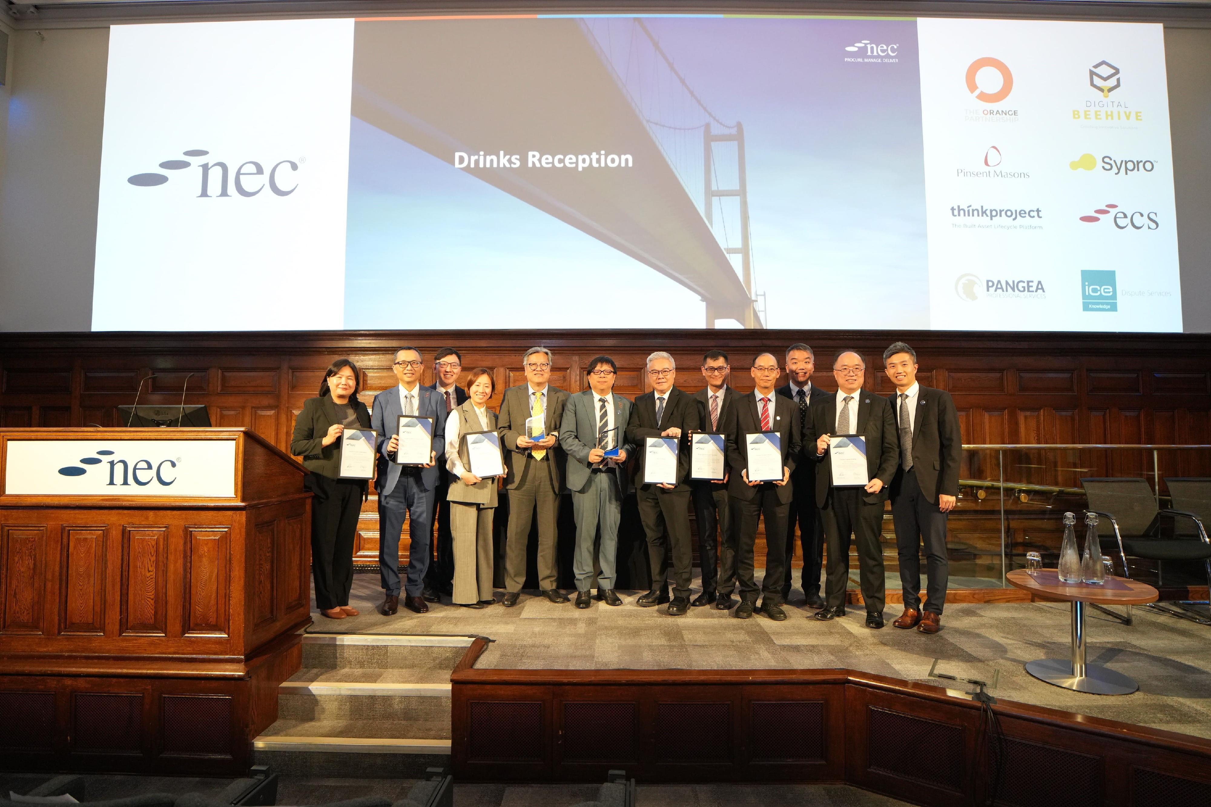 The Development Bureau (DEVB) and works departments won nine awards at the 2025 Martin Barnes Awards Ceremony in London, the United Kingdom, on June 16 (London time). Photo shows the awardee and representatives from the DEVB and works departments. 