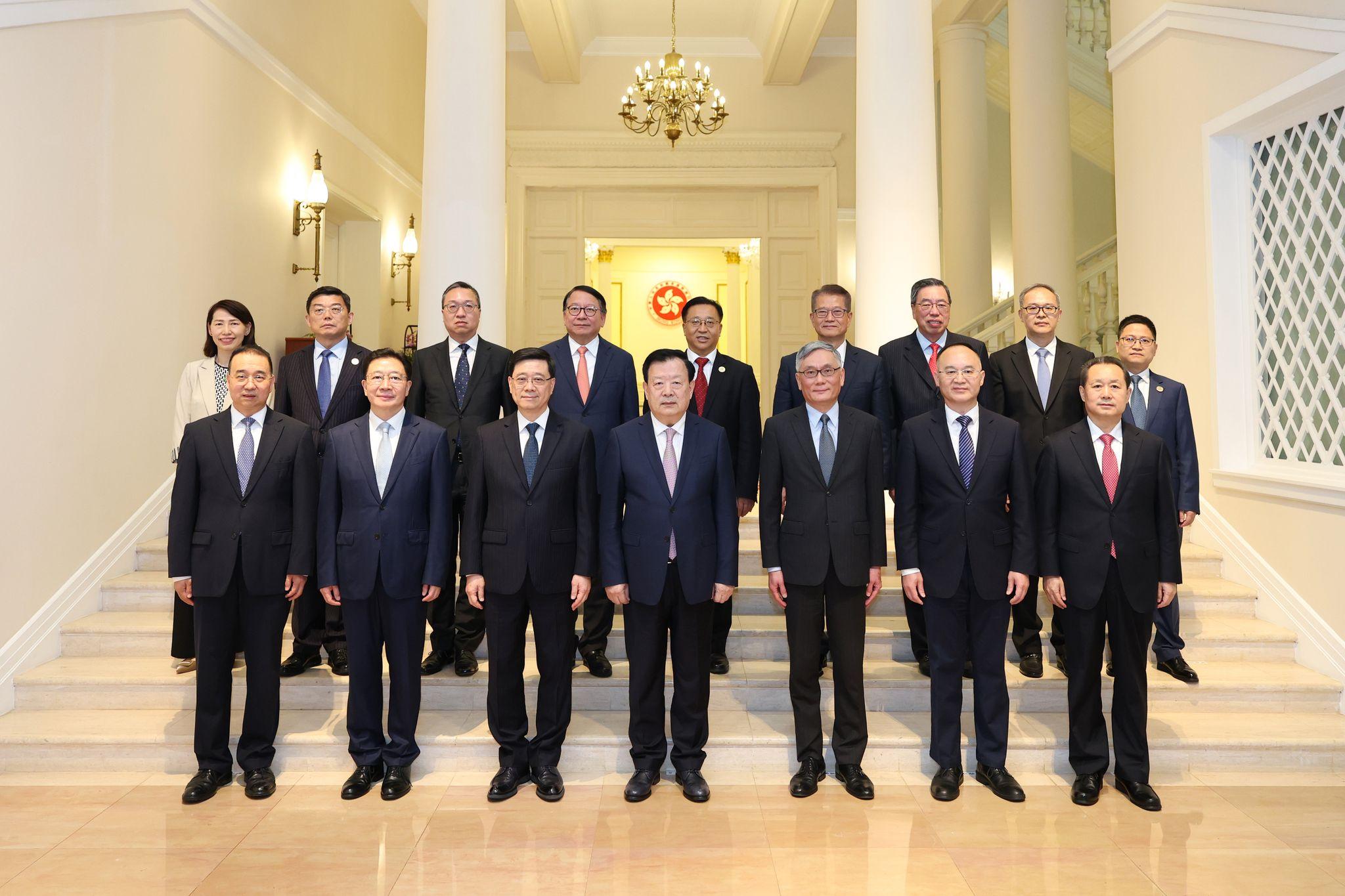 The Director of the Hong Kong and Macao Work Office of the Communist Party of China Central Committee and the Hong Kong and Macao Affairs Office of the State Council, Mr Xia Baolong (front row, centre), today (June 18) met with the Chief Executive, Mr John Lee (front row, third left), and the heads of the executive authorities, the legislature and the judiciary, and had exchanges with senior officials of the HKSAR Government at Government House.