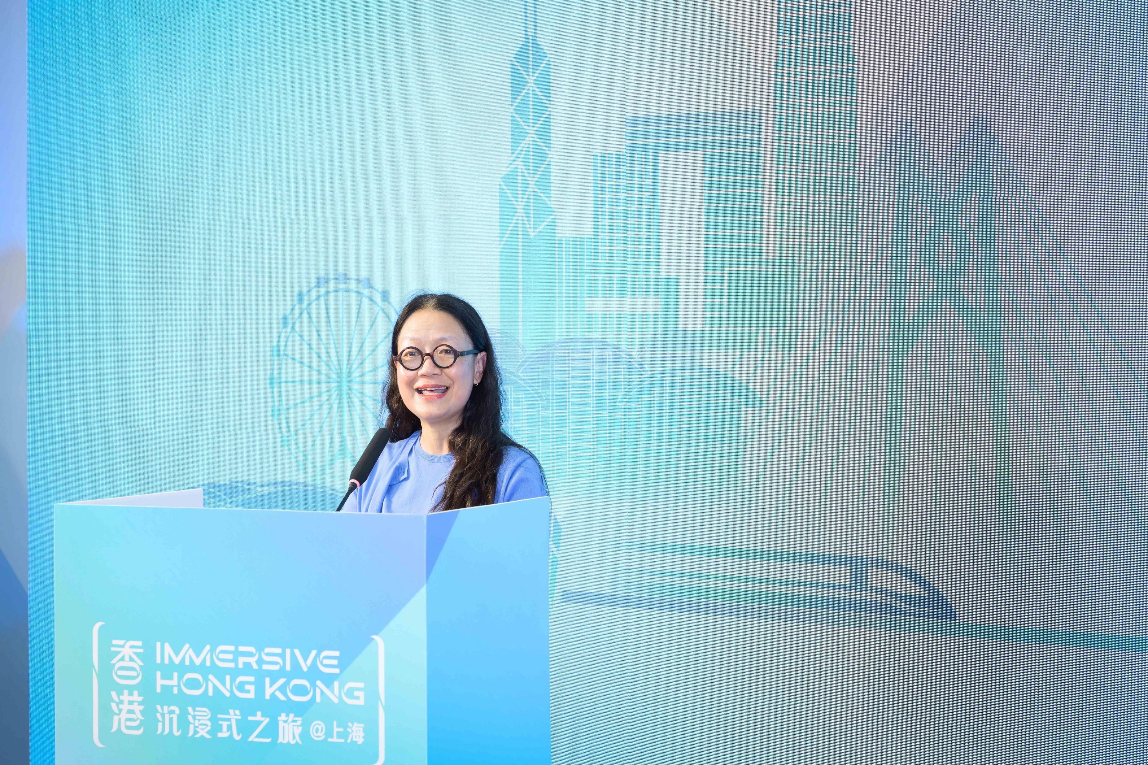The "Immersive Hong Kong" roving exhibition, which showcases the charm and vibrancy of Hong Kong through interactive art technology, opened in Shanghai today (June 19). The exhibition invites visitors from Shanghai and the Yangtze River Delta to explore the unique opportunities and potential for tourism, education, business and investment in Hong Kong. Photo shows the Director of Information Services, Mrs Apollonia Liu, giving a speech at the opening ceremony.