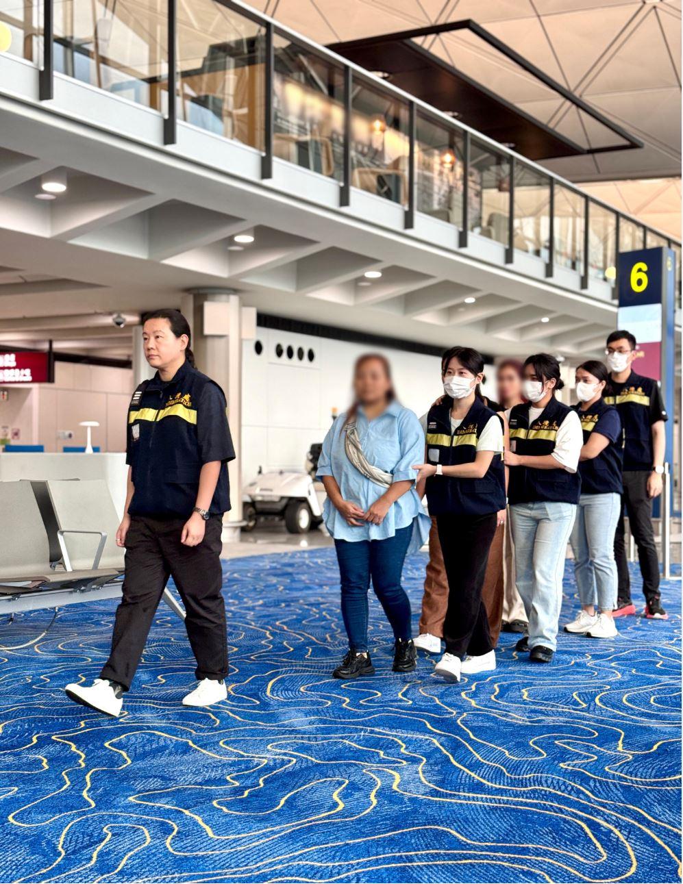 The Immigration Department (ImmD) carried out repatriation operations from June 18 to today (June 20). A total of 56 unsubstantiated non-refoulement claimants were repatriated to their places of origin. Photo shows removees being escorted by ImmD officers to depart from Hong Kong.