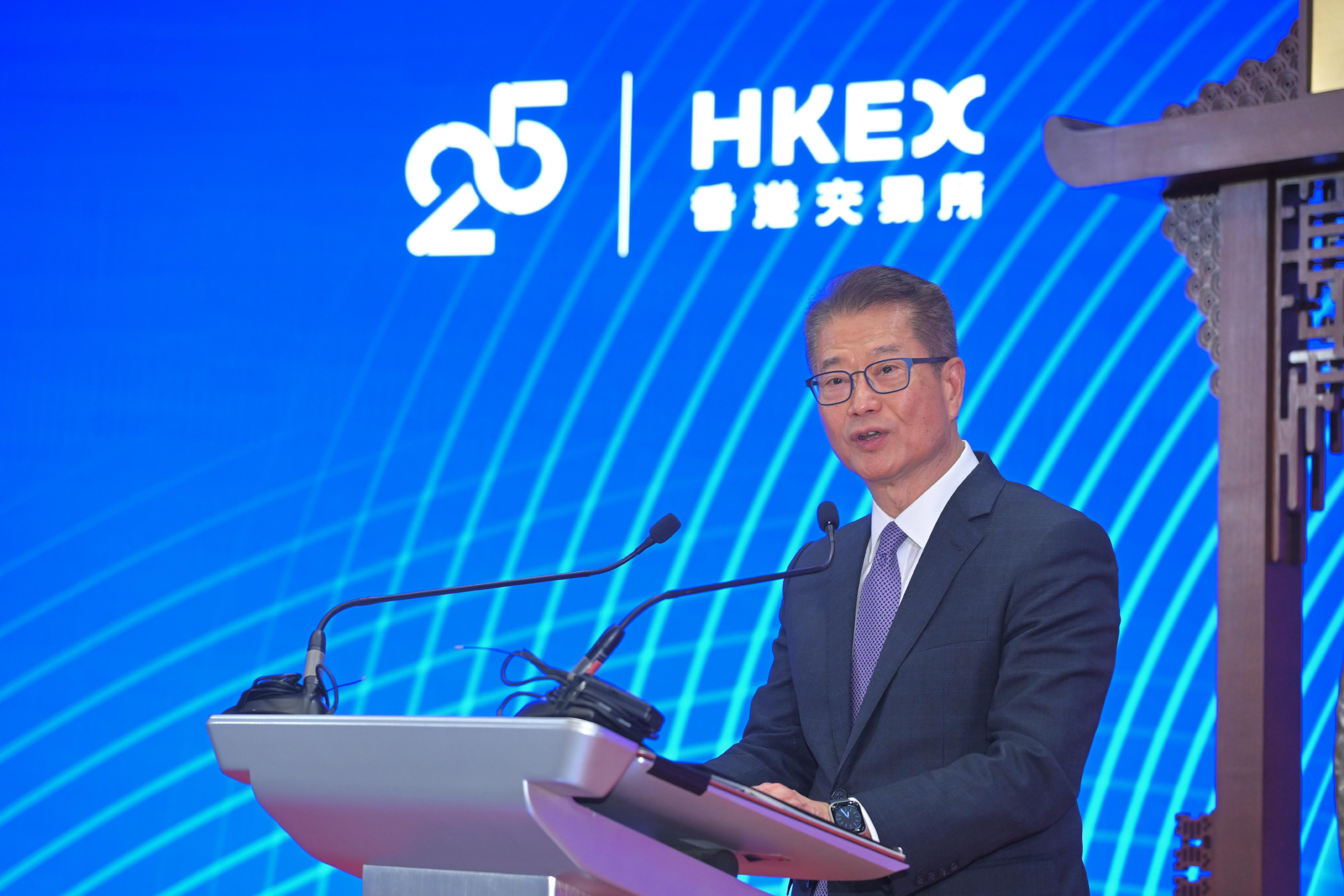 The Financial Secretary, Mr Paul Chan, speaks at the HKEX 25th Anniversary Celebrations today (June 20).