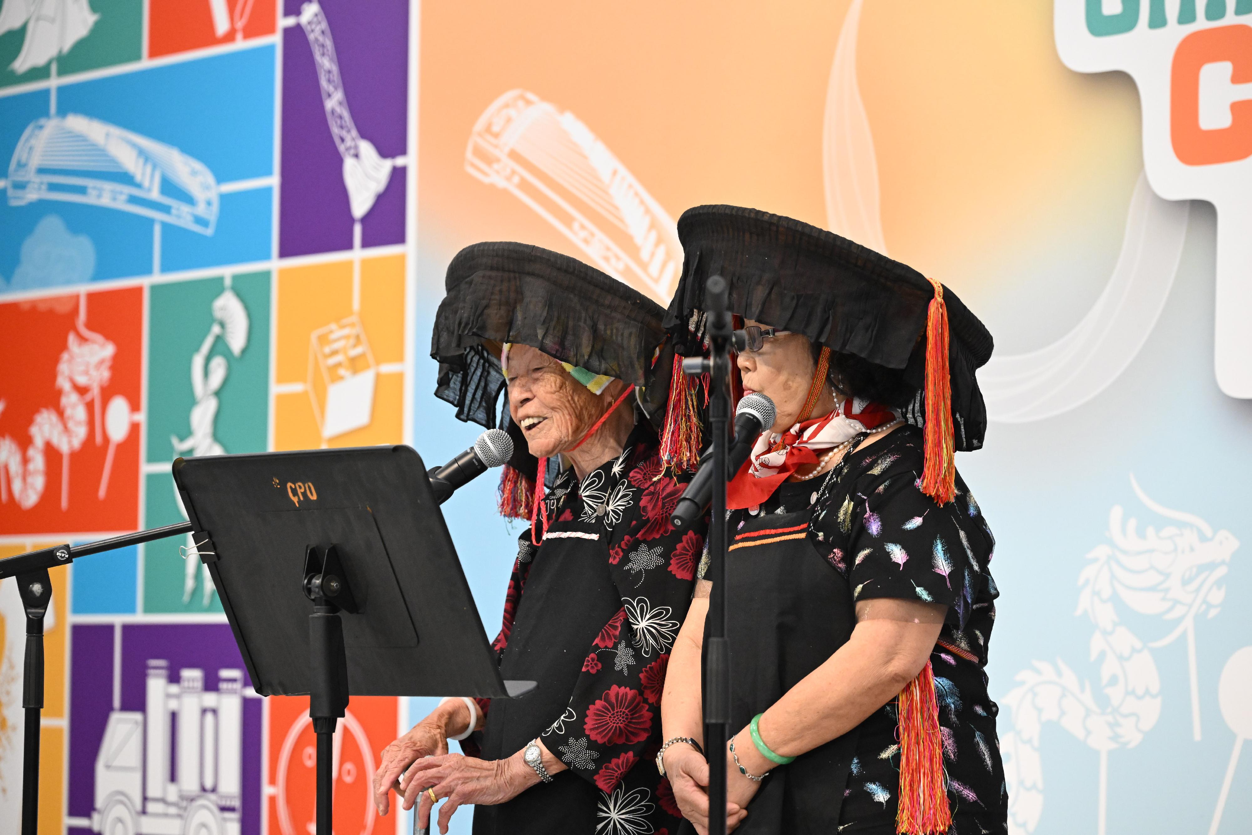 The "Encountering Chinese Culture" Carnival of the Chinese Culture Festival 2025 was held today (June 22) in Sha Tin. Photo shows the Hakka folk song performance by Sai Kung Hakka Folk Song Group. 