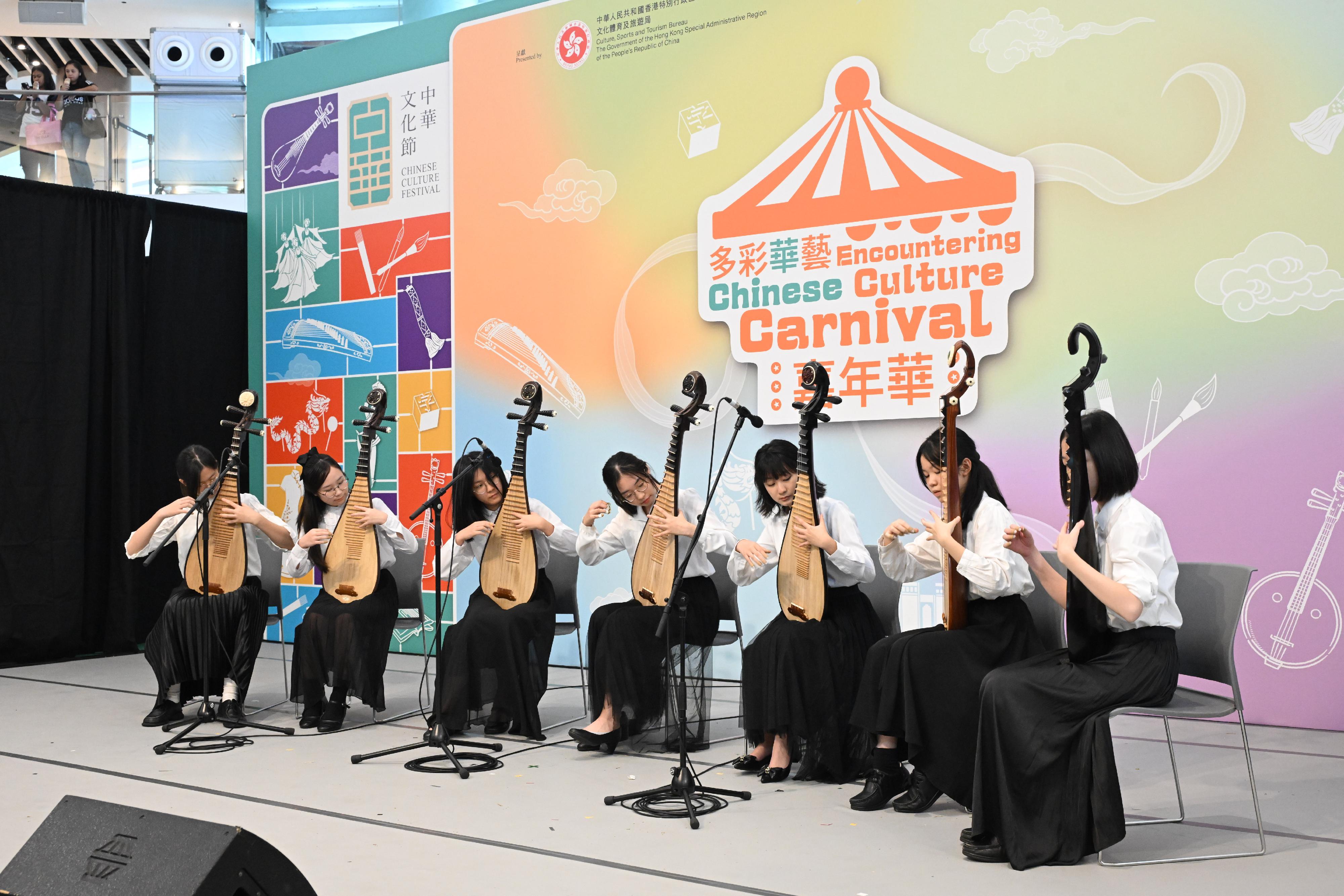The "Encountering Chinese Culture" Carnival of the Chinese Culture Festival 2025 was held today (June 22) in Sha Tin. Photo shows the Chinese music performance by a trainee's ensemble from the Music Office of the Leisure and Cultural Services Department. 