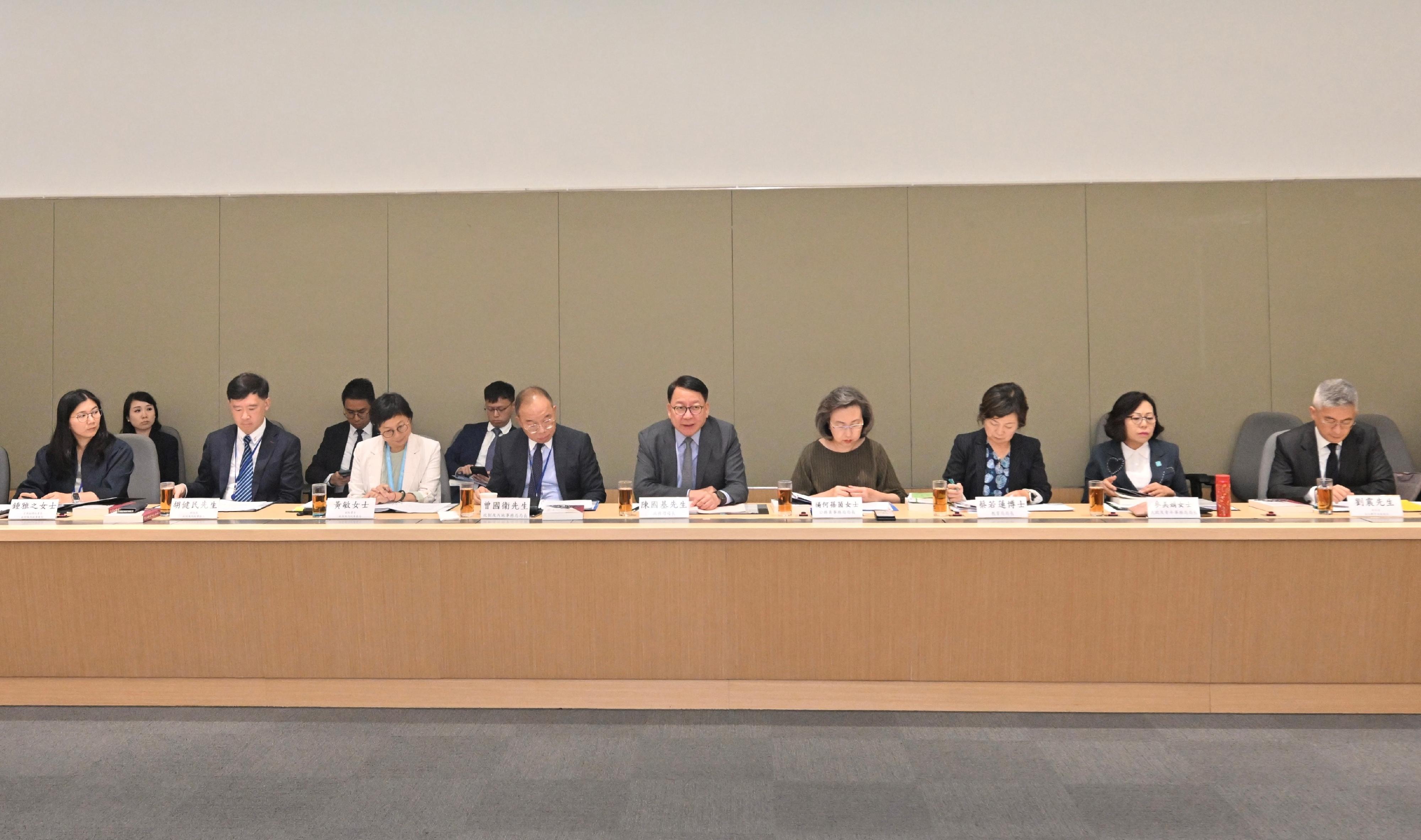 The Chairman of the Constitution and Basic Law Promotion Steering Committee and Chief Secretary for Administration, Mr Chan Kwok-ki (front row, centre), today (June 23) chairs the third meeting of the Working Group on Patriotic Education under the Committee. 