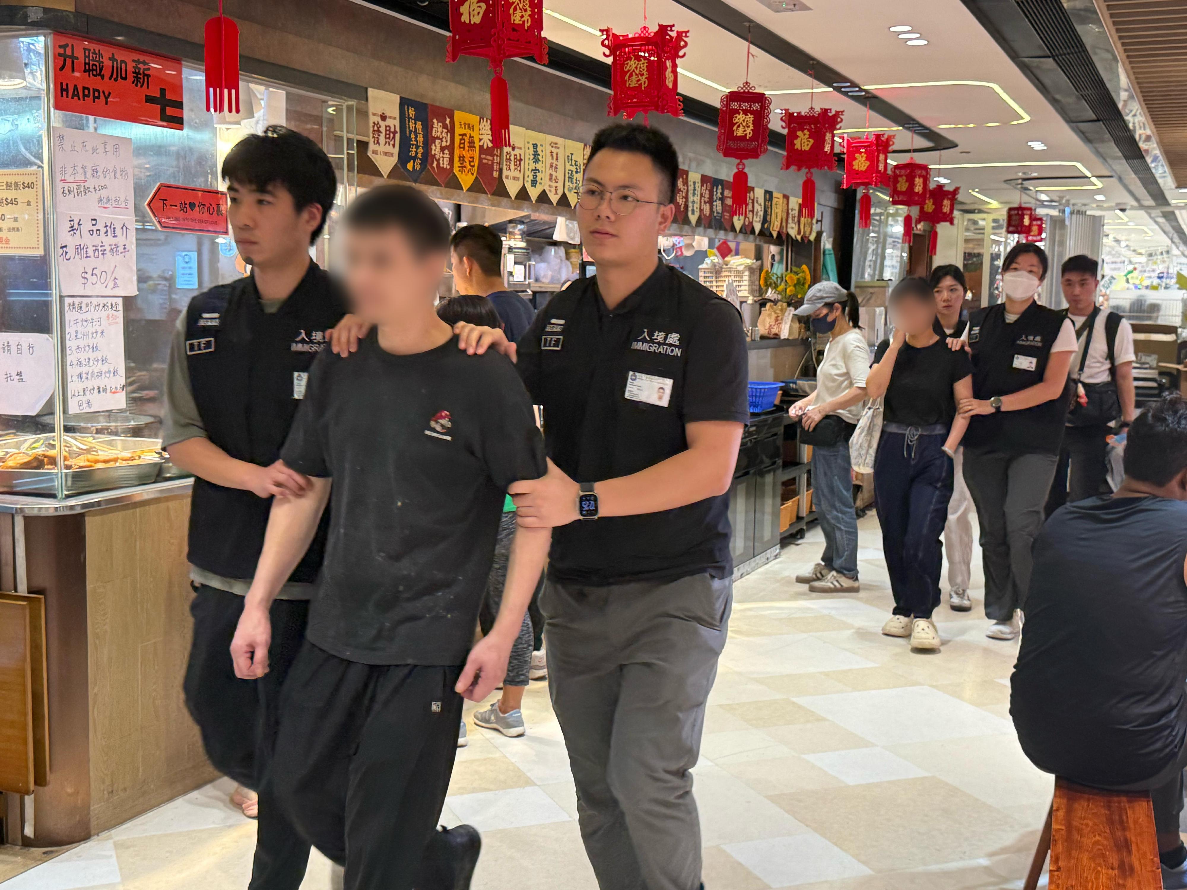 The Immigration Department mounted a series of anti-illegal worker focused operations from May 19 to yesterday (June 23). Photo shows suspected illegal workers arrested during an operation.
